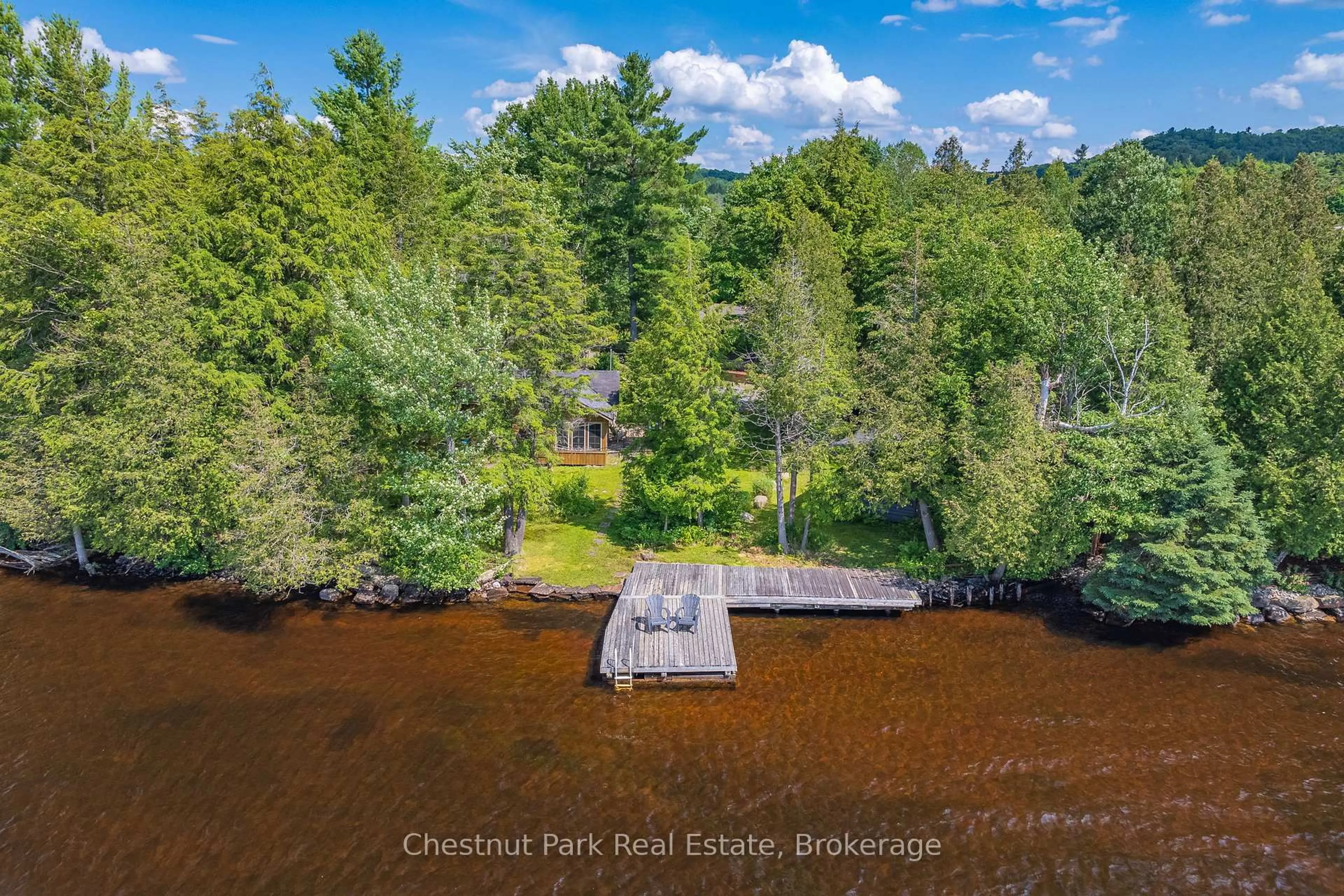 A pic from outside/outdoor area/front of a property/back of a property/a pic from drone, water/lake/river/ocean view for 464 Springfield Rd, Huntsville Ontario P1H 2J3
