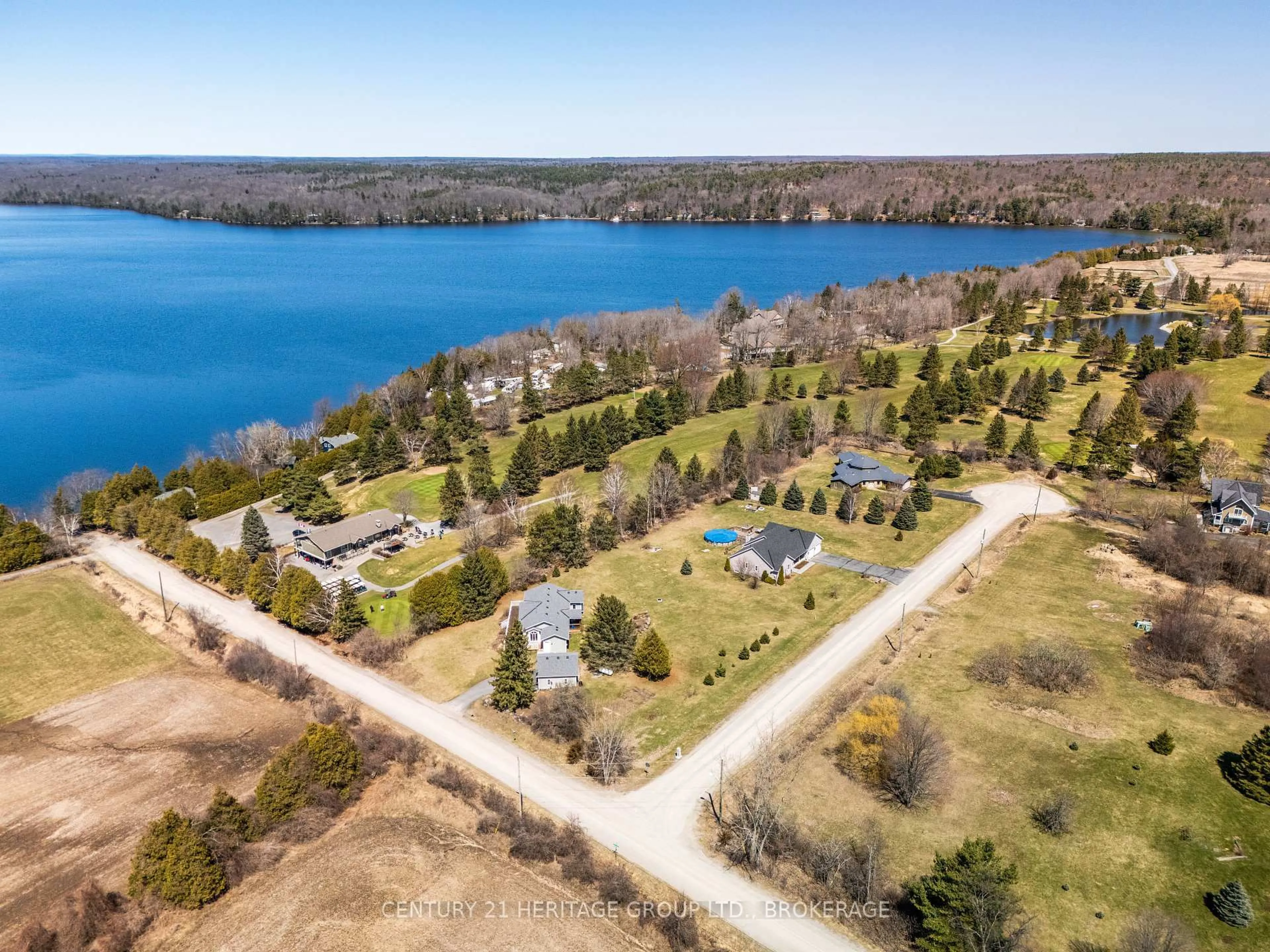 A pic from outside/outdoor area/front of a property/back of a property/a pic from drone, water/lake/river/ocean view for 445 Wolfe Lake Rd, Westport Ontario K0G 1X0