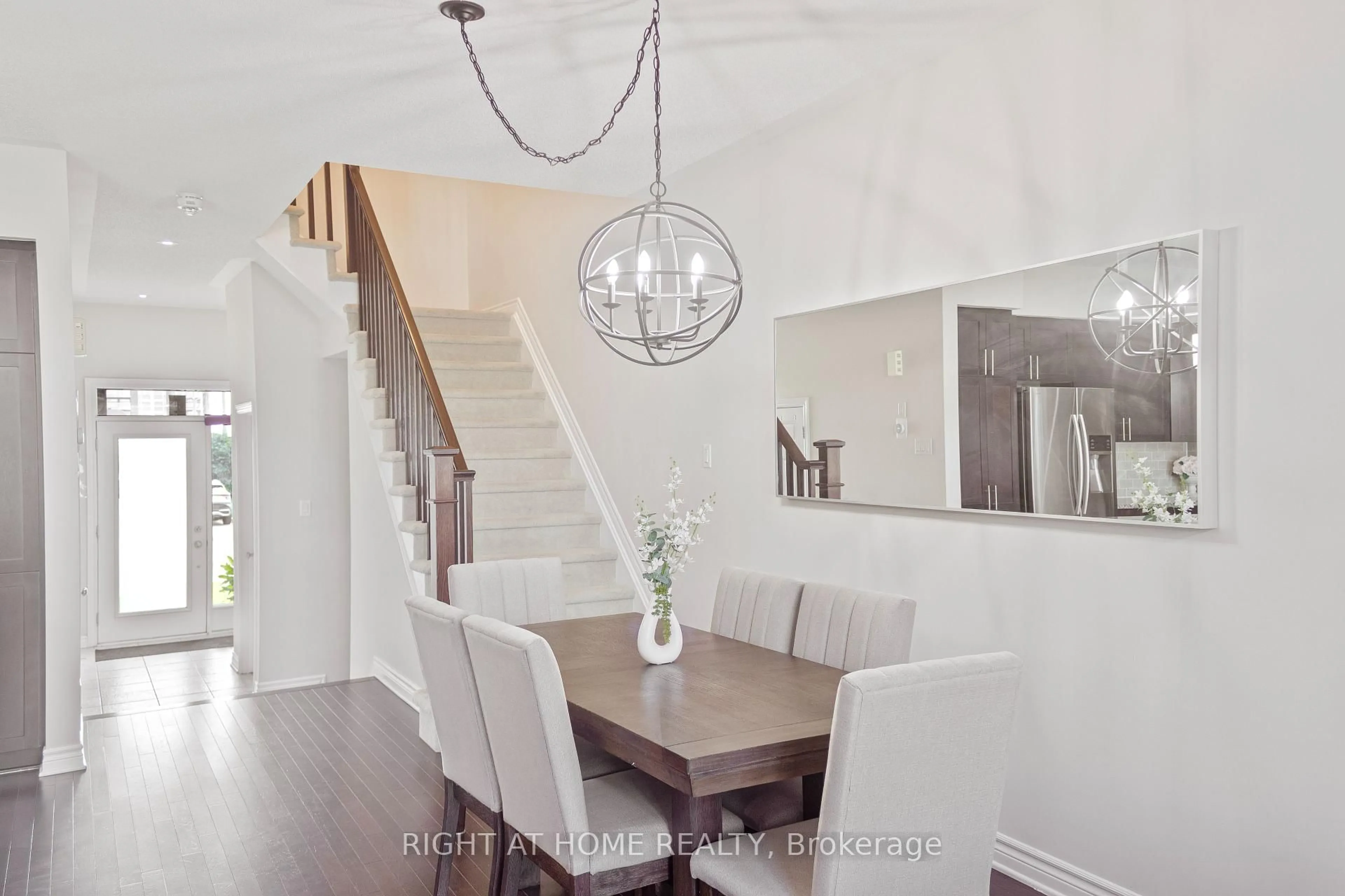 Dining room, wood/laminate floor for 152 Popplewell Cres, Ottawa Ontario K2J 5P7