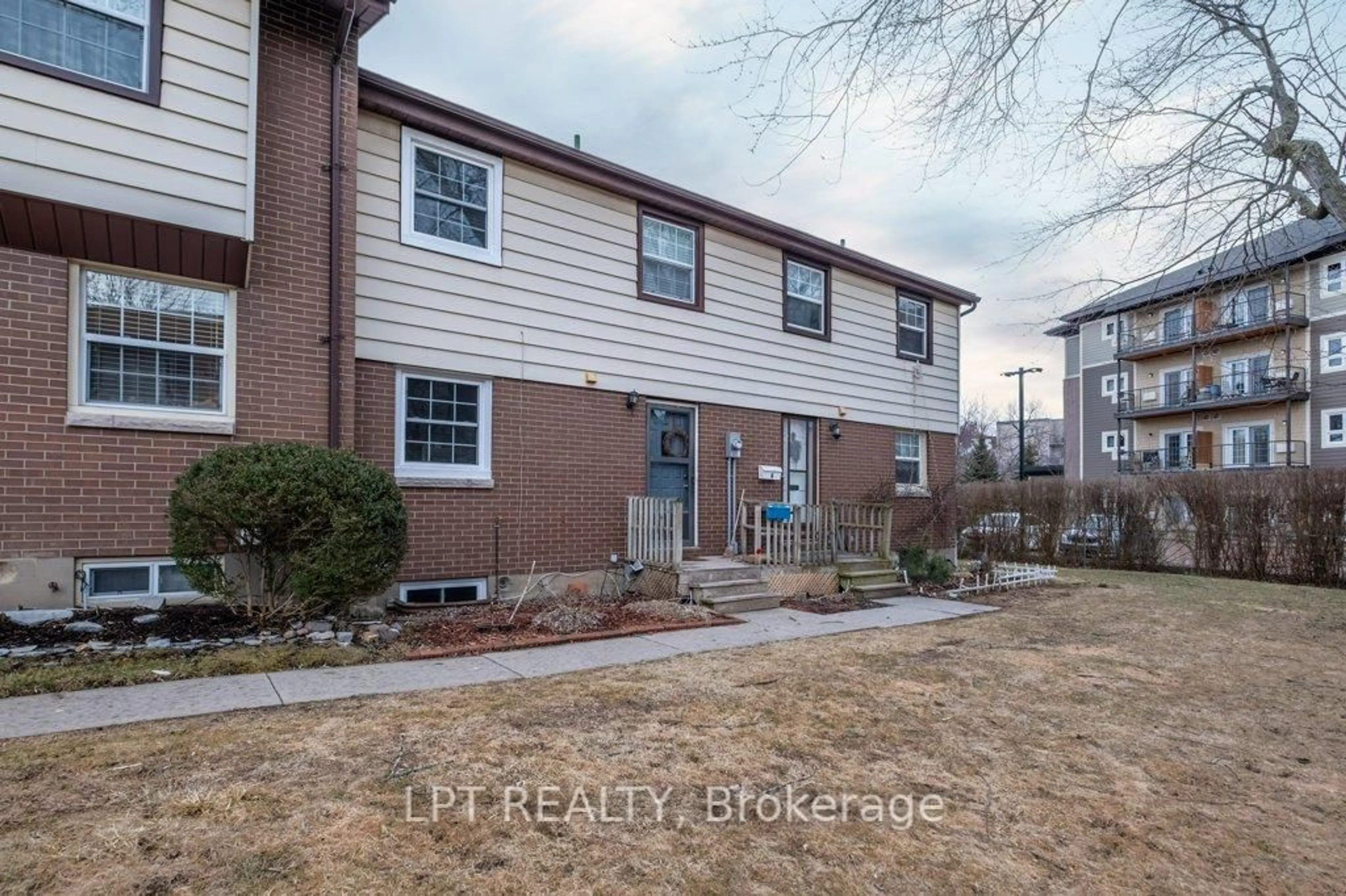 A pic from outside/outdoor area/front of a property/back of a property/a pic from drone, street for 126 Notch Hill Rd #5, Kingston Ontario K7M 2X1