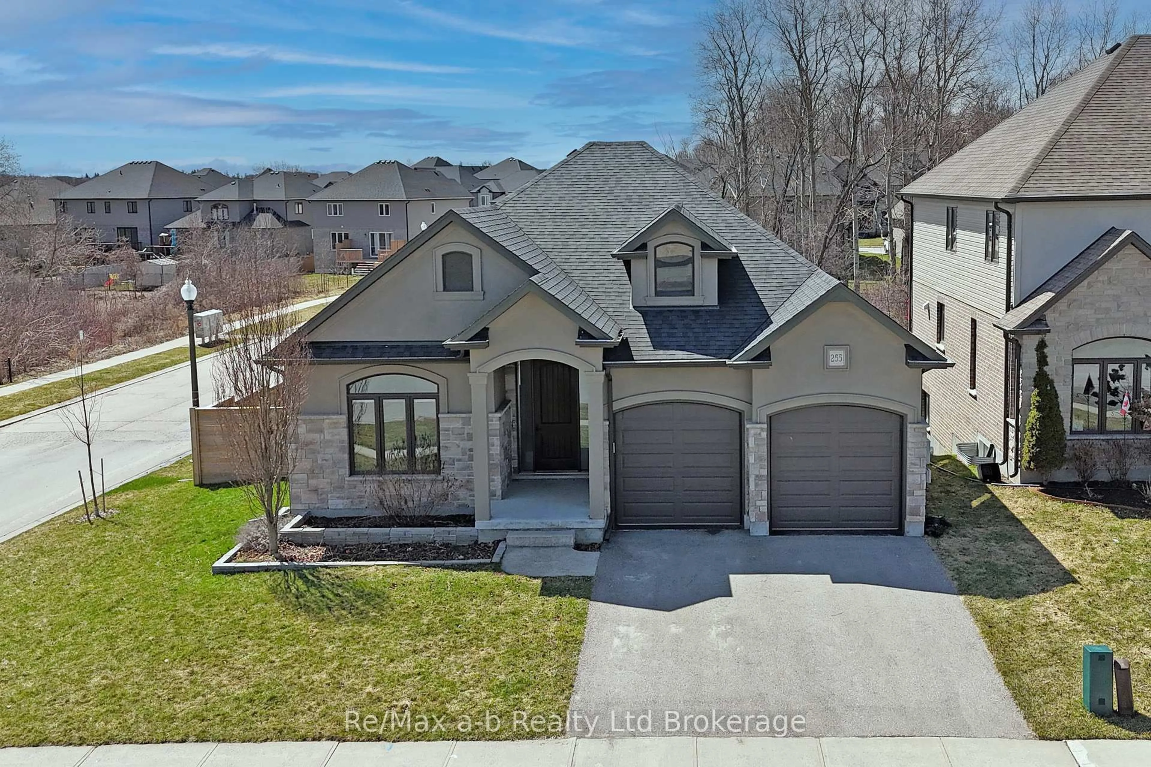 Home with brick exterior material, street for 255 Wedgewood Dr, Woodstock Ontario N4T 0J1