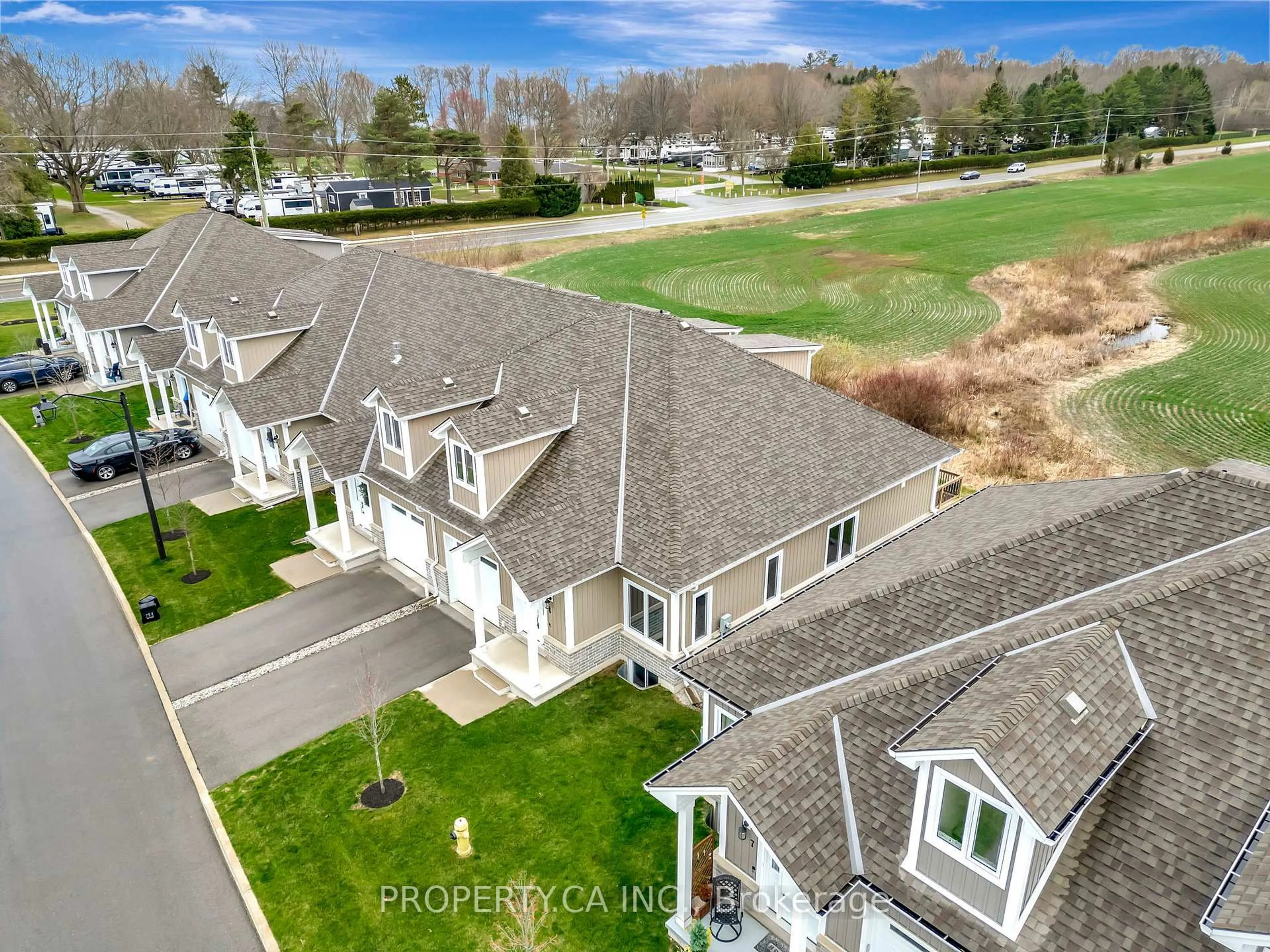 A pic from outside/outdoor area/front of a property/back of a property/a pic from drone, unknown for 744 Nelson St #6, Norfolk Ontario N0A 1N0