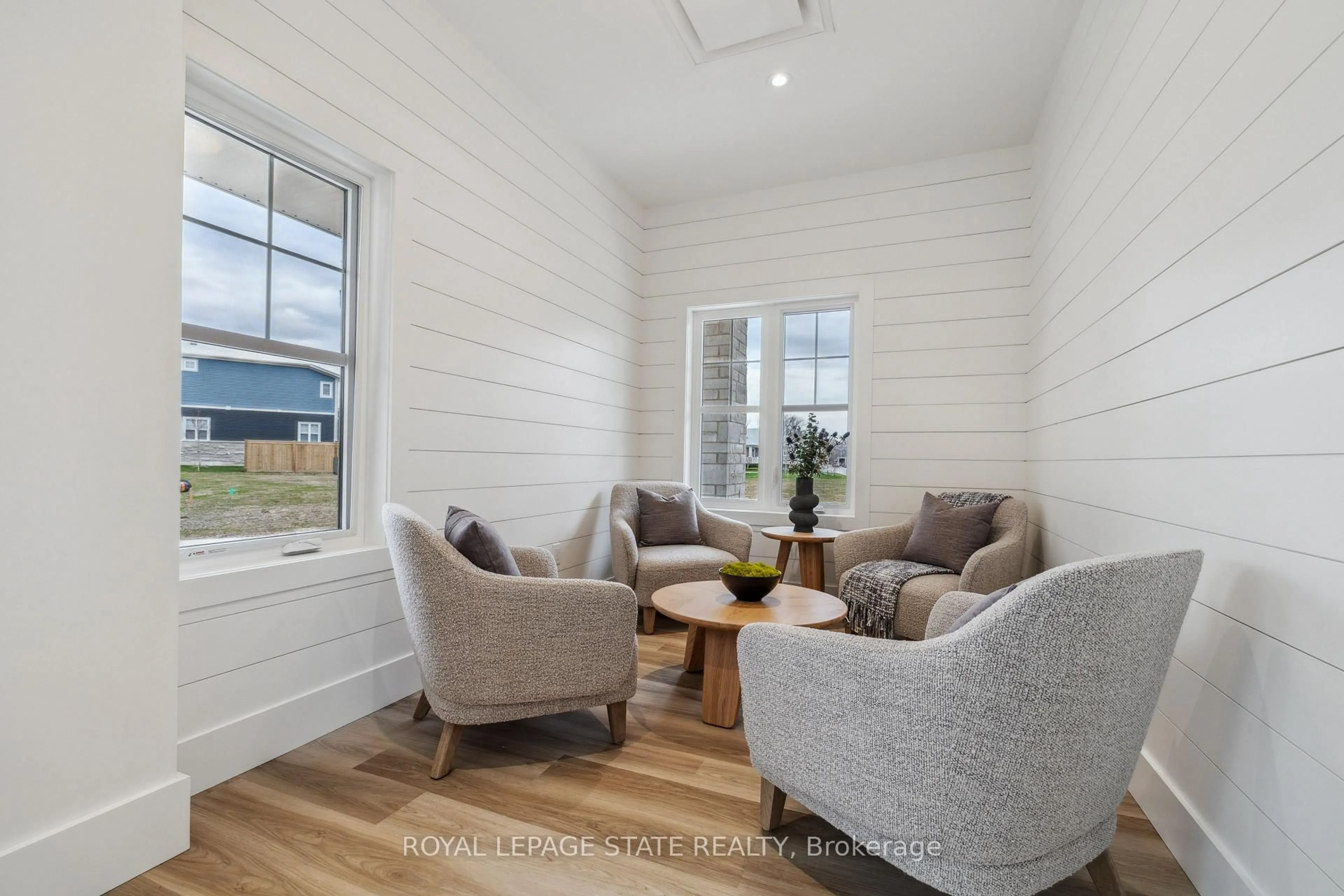 Living room with furniture, wood/laminate floor for 11 Cyclone Way, Fort Erie Ontario L0S 1B0
