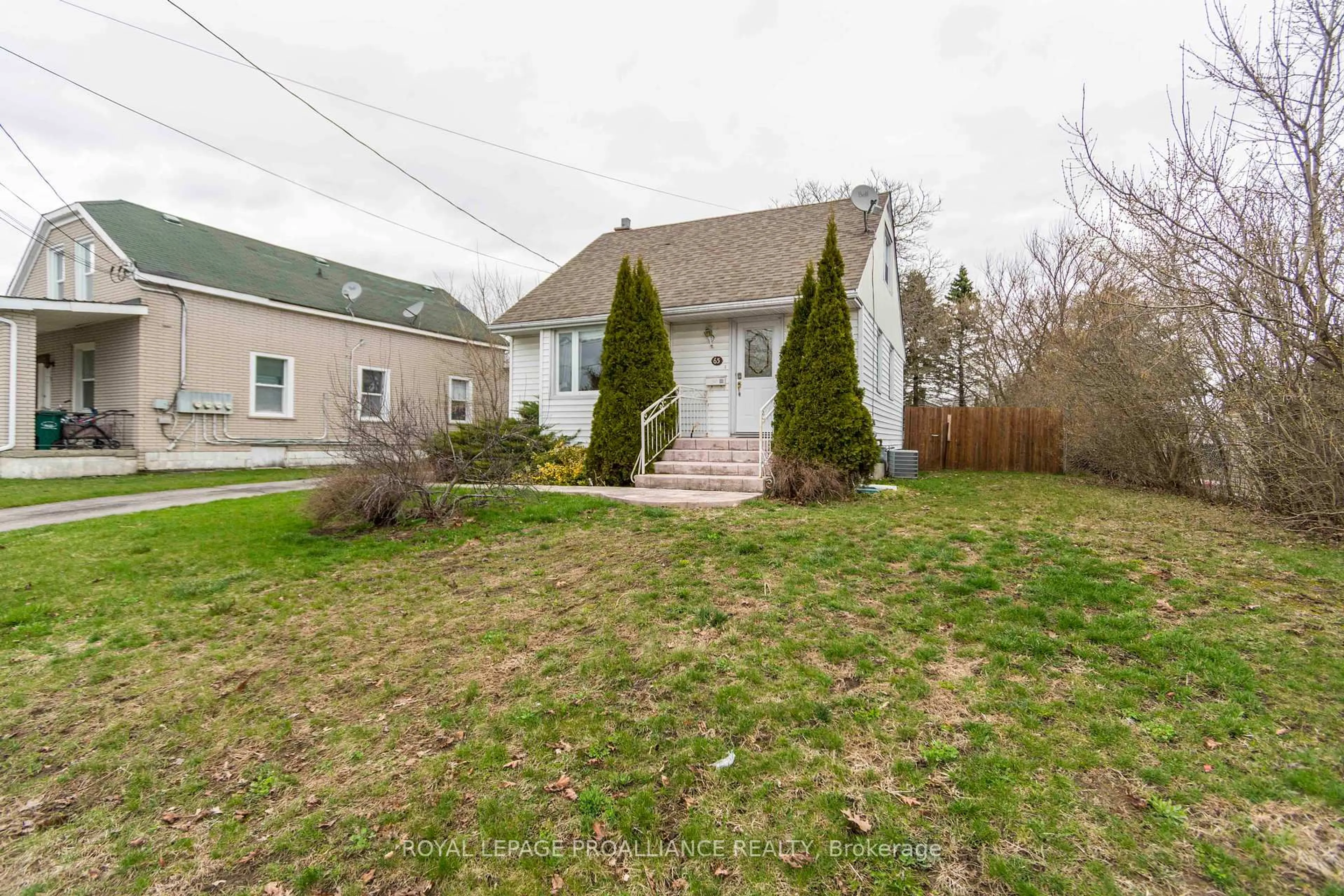 A pic from outside/outdoor area/front of a property/back of a property/a pic from drone, street for 65 Leopold St, Quinte West Ontario K8V 2K3