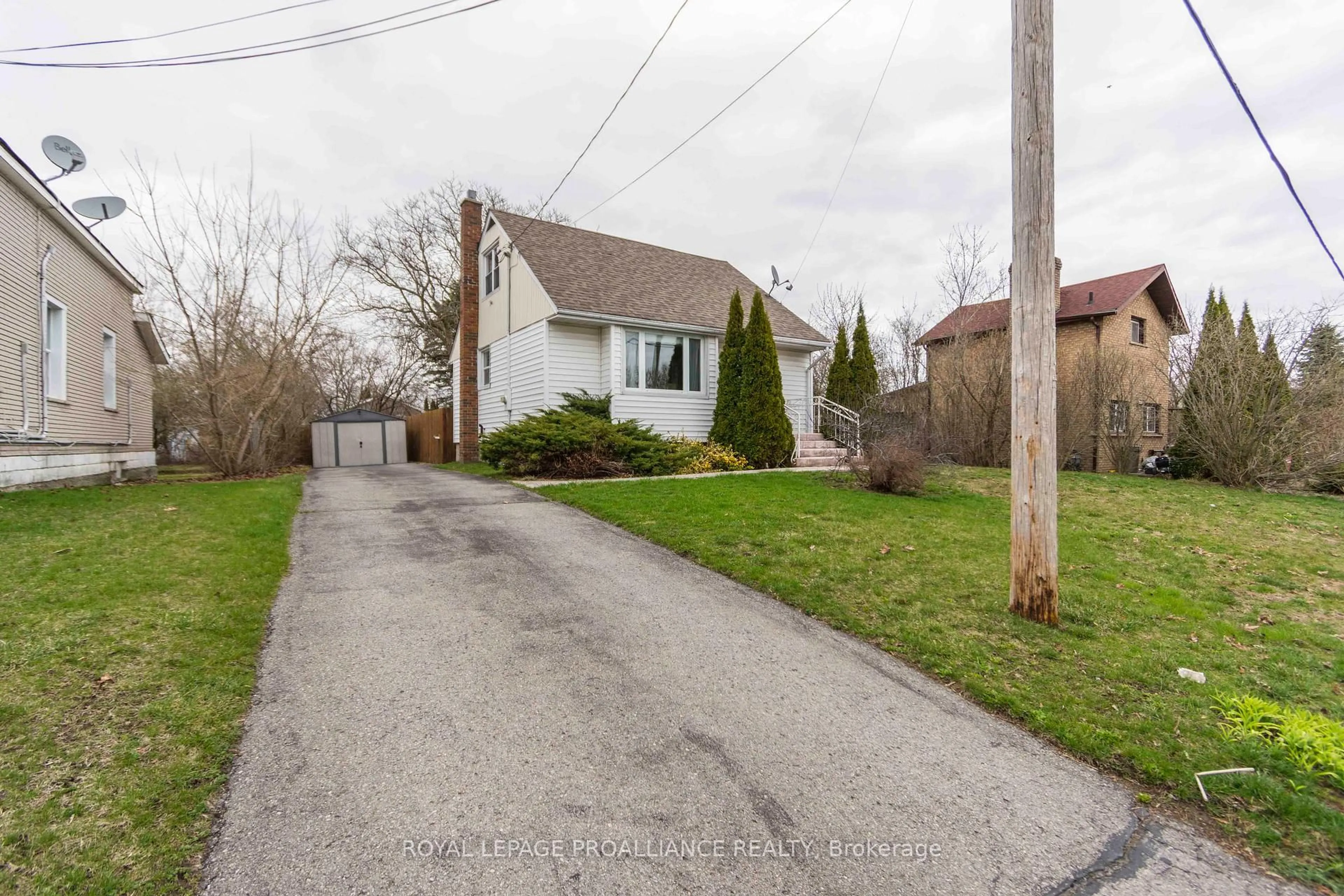 A pic from outside/outdoor area/front of a property/back of a property/a pic from drone, street for 65 Leopold St, Quinte West Ontario K8V 2K3