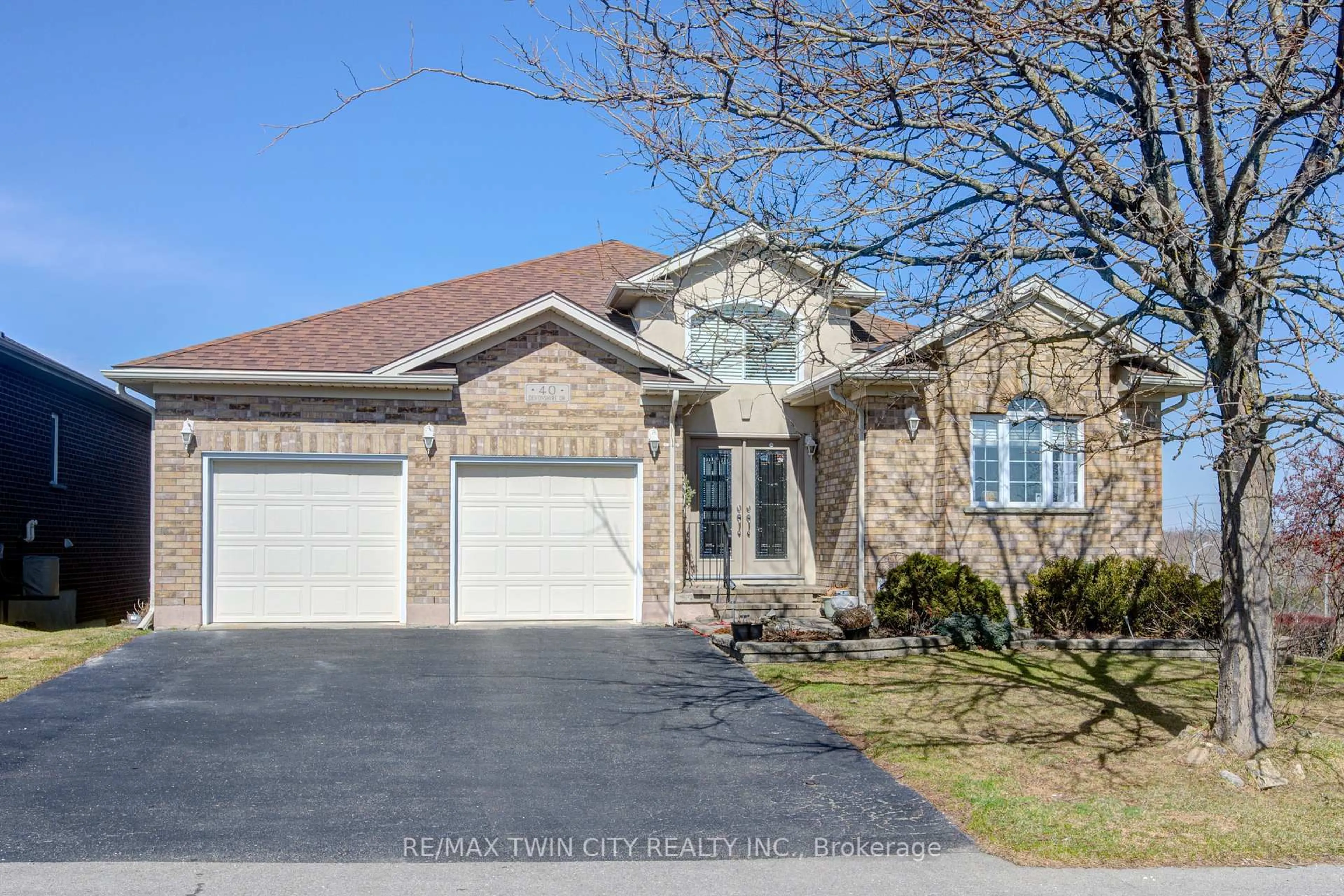 Home with brick exterior material, street for 40 Devonshire Dr, Wilmot Ontario N3A 4J7