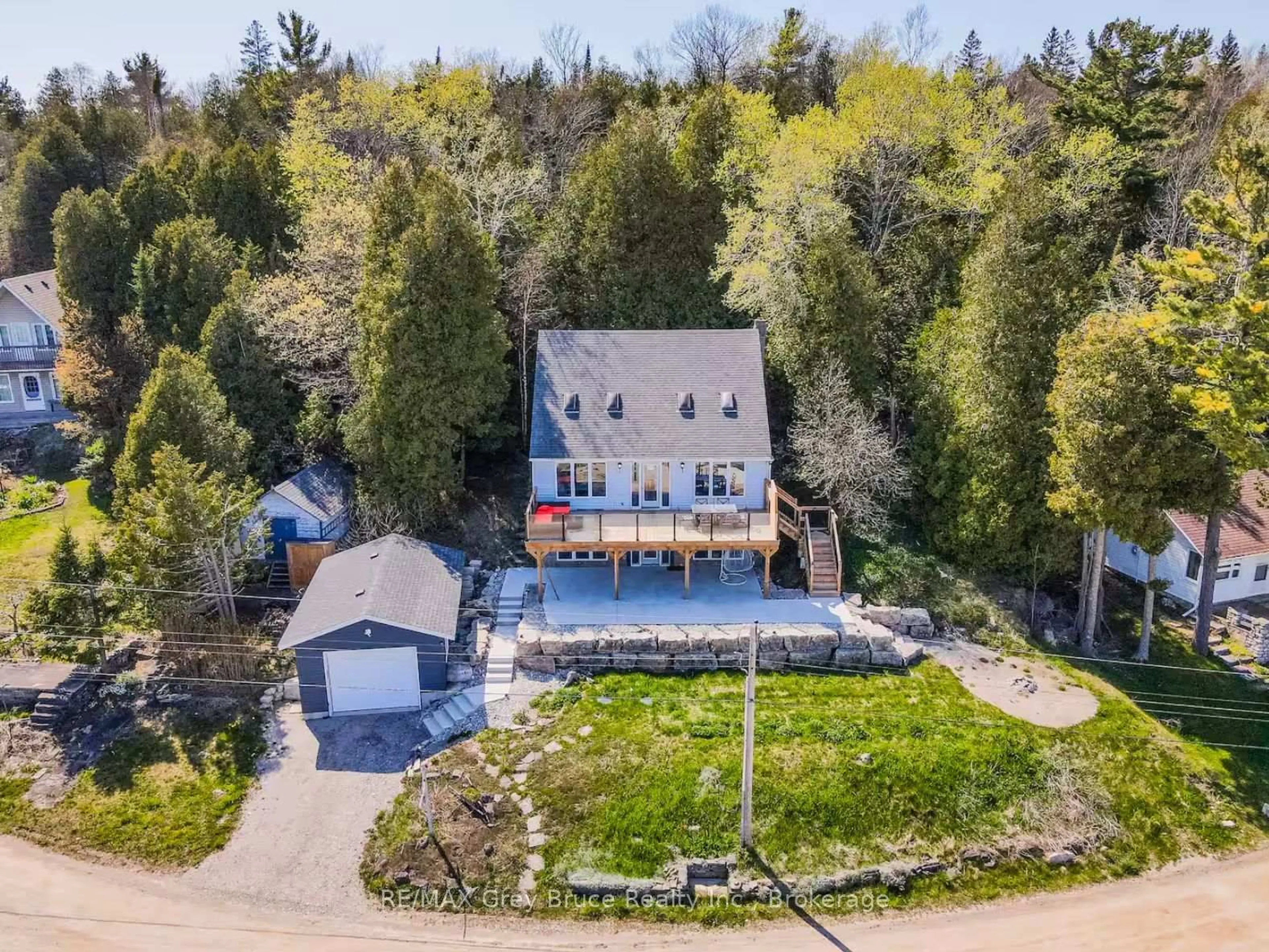 A pic from outside/outdoor area/front of a property/back of a property/a pic from drone, water/lake/river/ocean view for 101 North Shore Rd, Northern Bruce Peninsula Ontario N0H 1W0