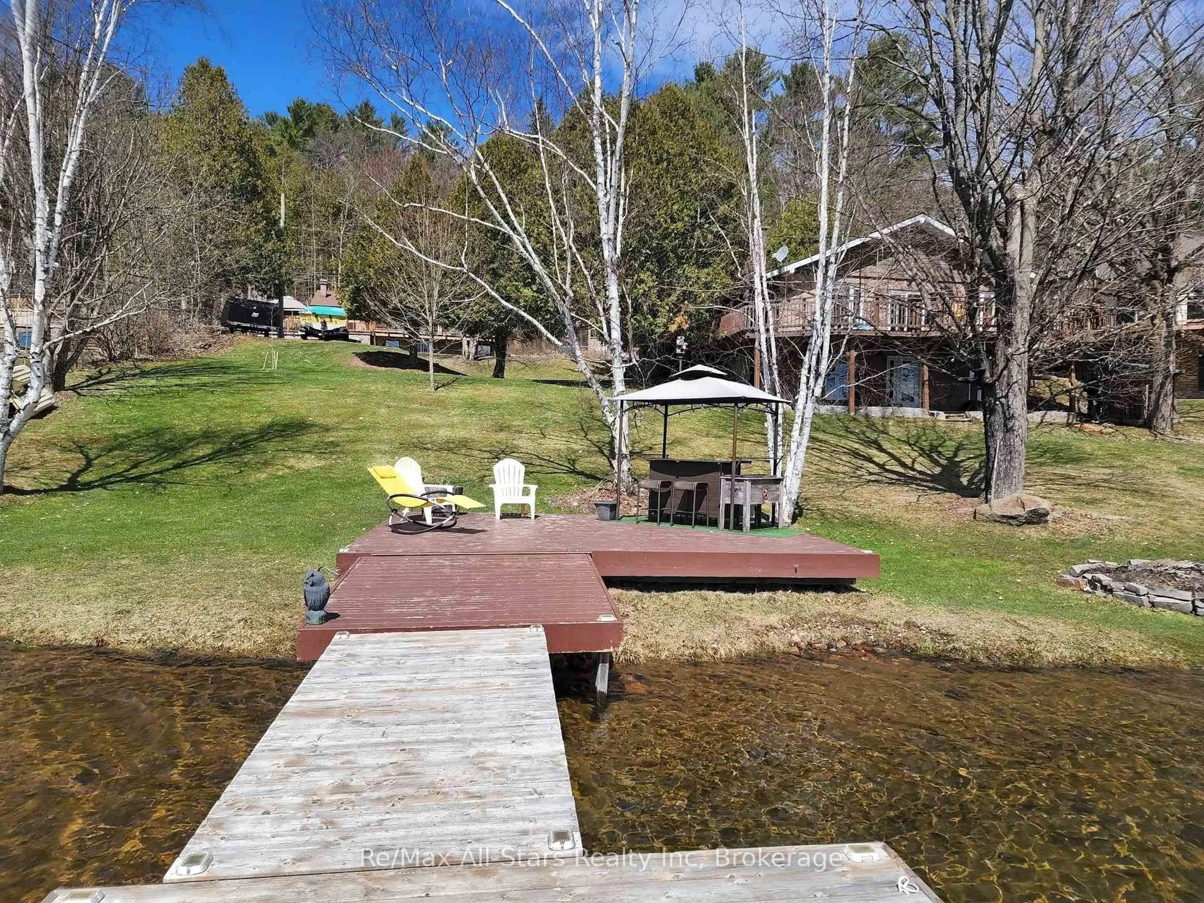 A pic from outside/outdoor area/front of a property/back of a property/a pic from drone, water/lake/river/ocean view for 1082 Kawagama Lake Rd, Algonquin Highlands Ontario P0A 1E0