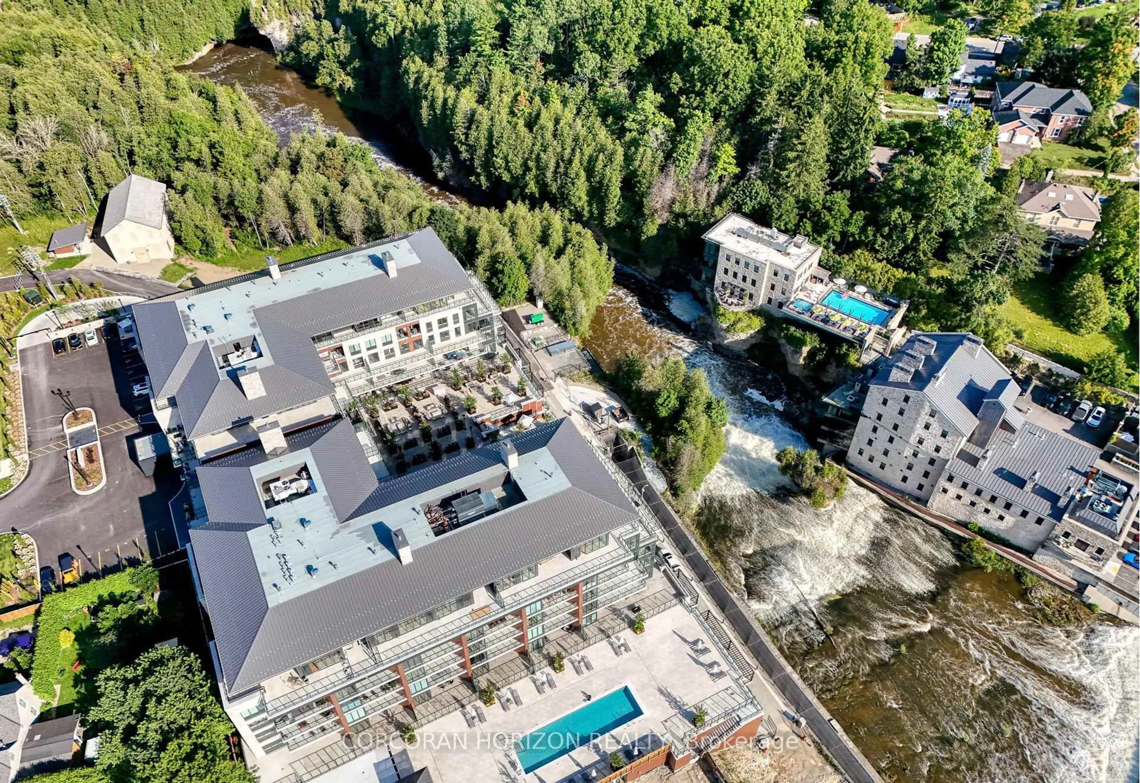 A pic from outside/outdoor area/front of a property/back of a property/a pic from drone, unknown for 6523 Wellington 7 Rd #105, Centre Wellington Ontario N0B 1S0