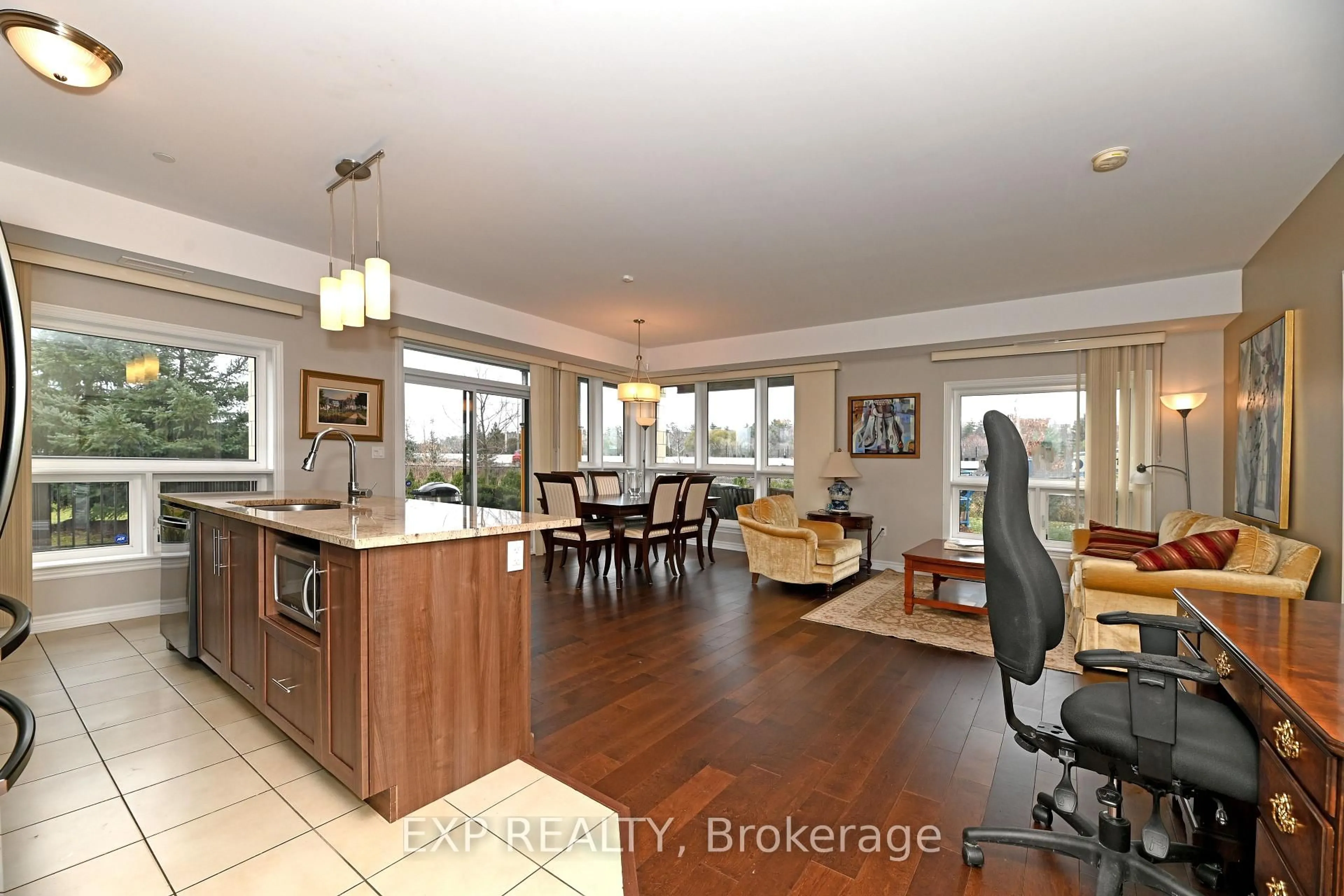 Open concept kitchen, wood/laminate floor for 120 Prestige Circ #101, Ottawa Ontario K4A 1B4