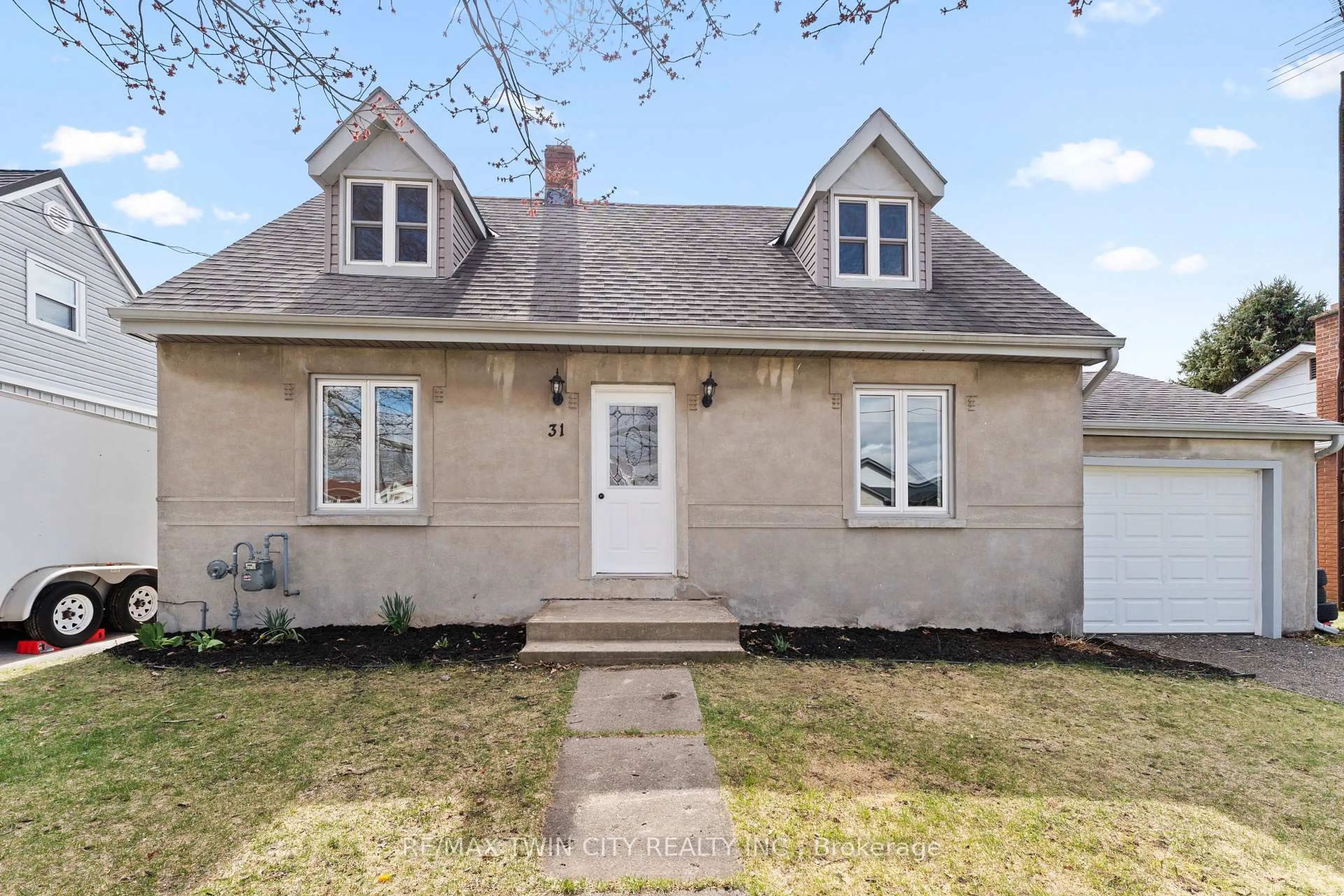 Home with vinyl exterior material, street for 31 George St, Norfolk Ontario N0E 1G0