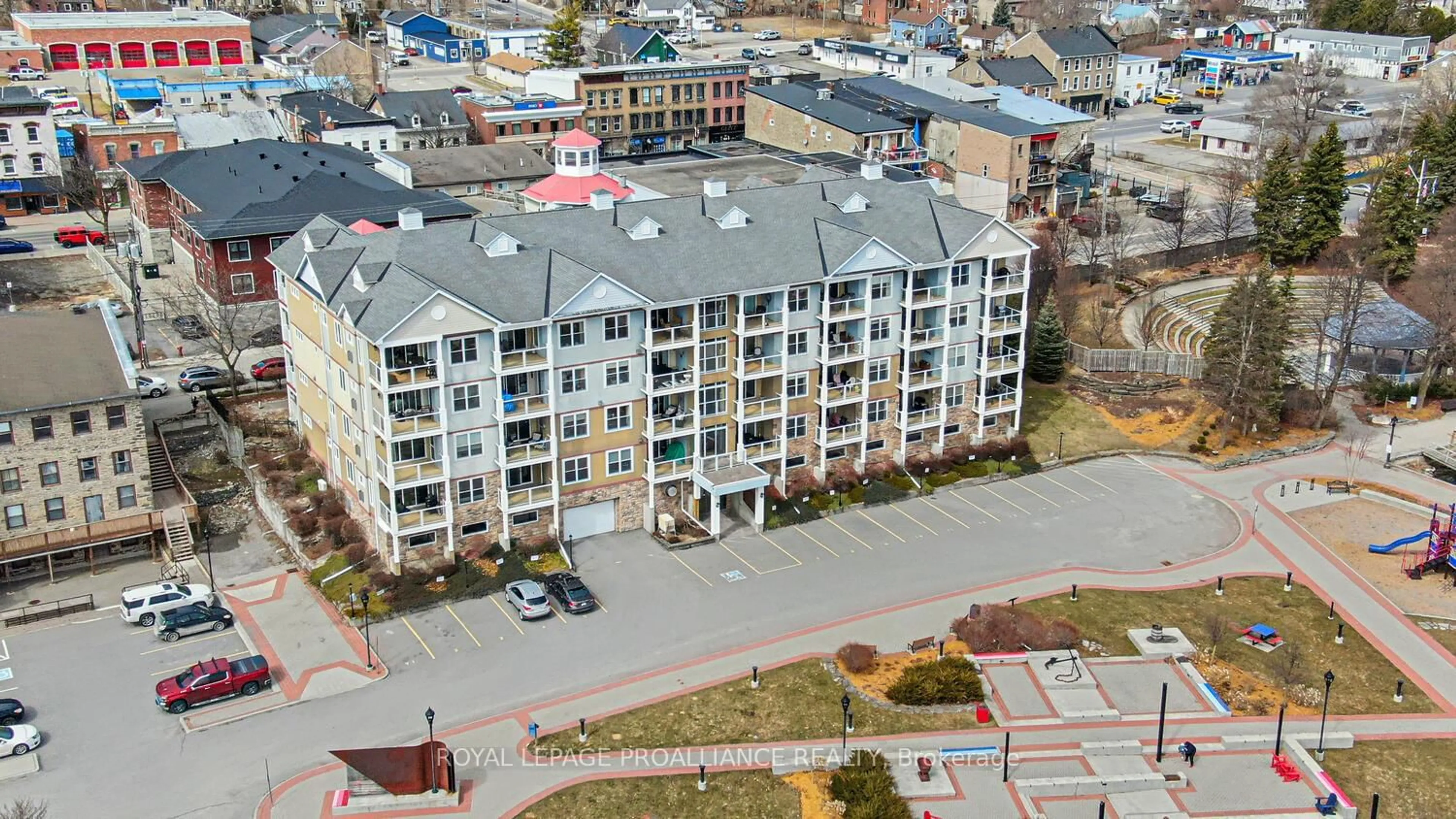 A pic from outside/outdoor area/front of a property/back of a property/a pic from drone, city buildings view from balcony for 175 Water St #207, Prescott Ontario K0E 1T0