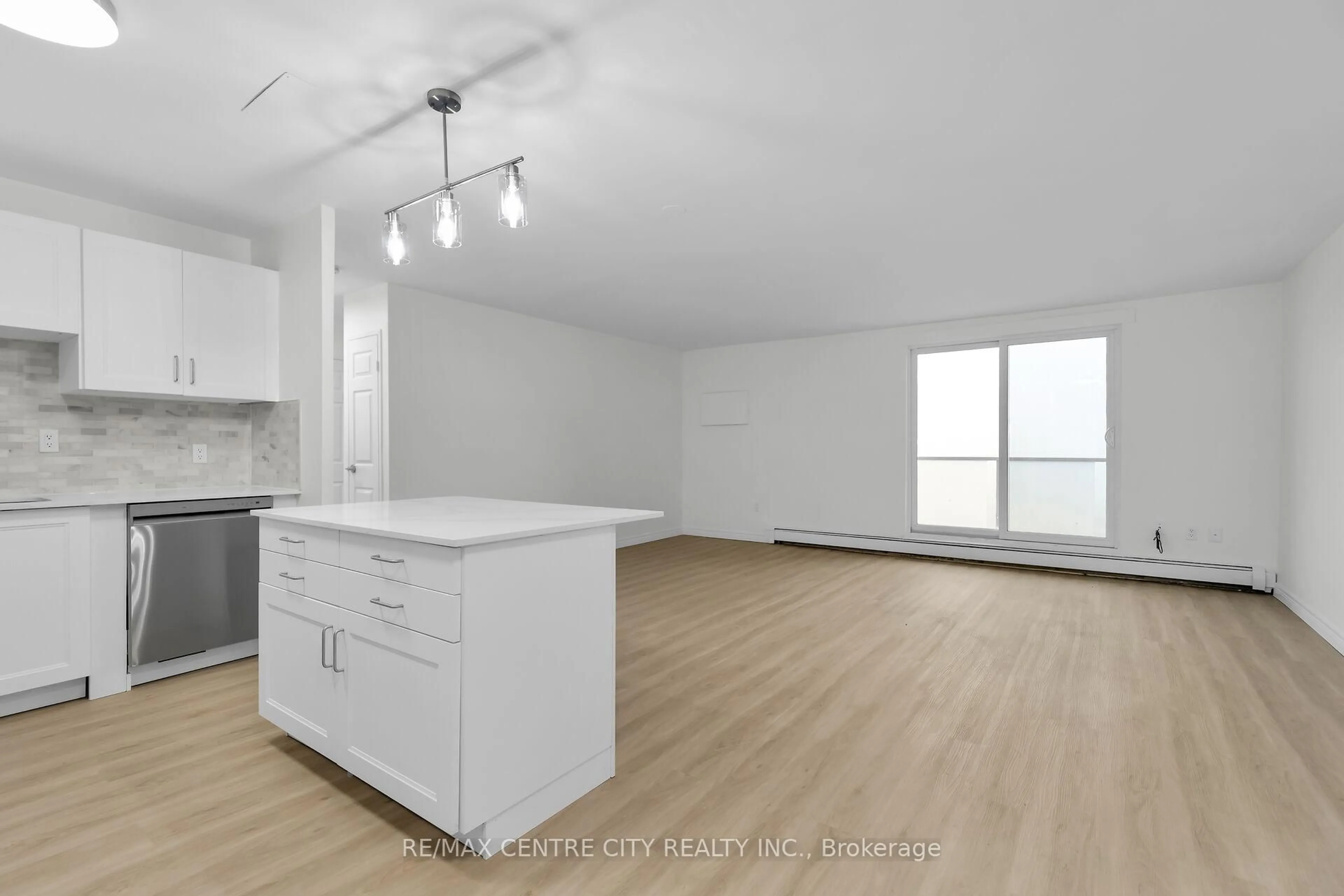 Open concept kitchen, wood/laminate floor for 583 Mornington Ave #1002, London East Ontario N5Y 3E9