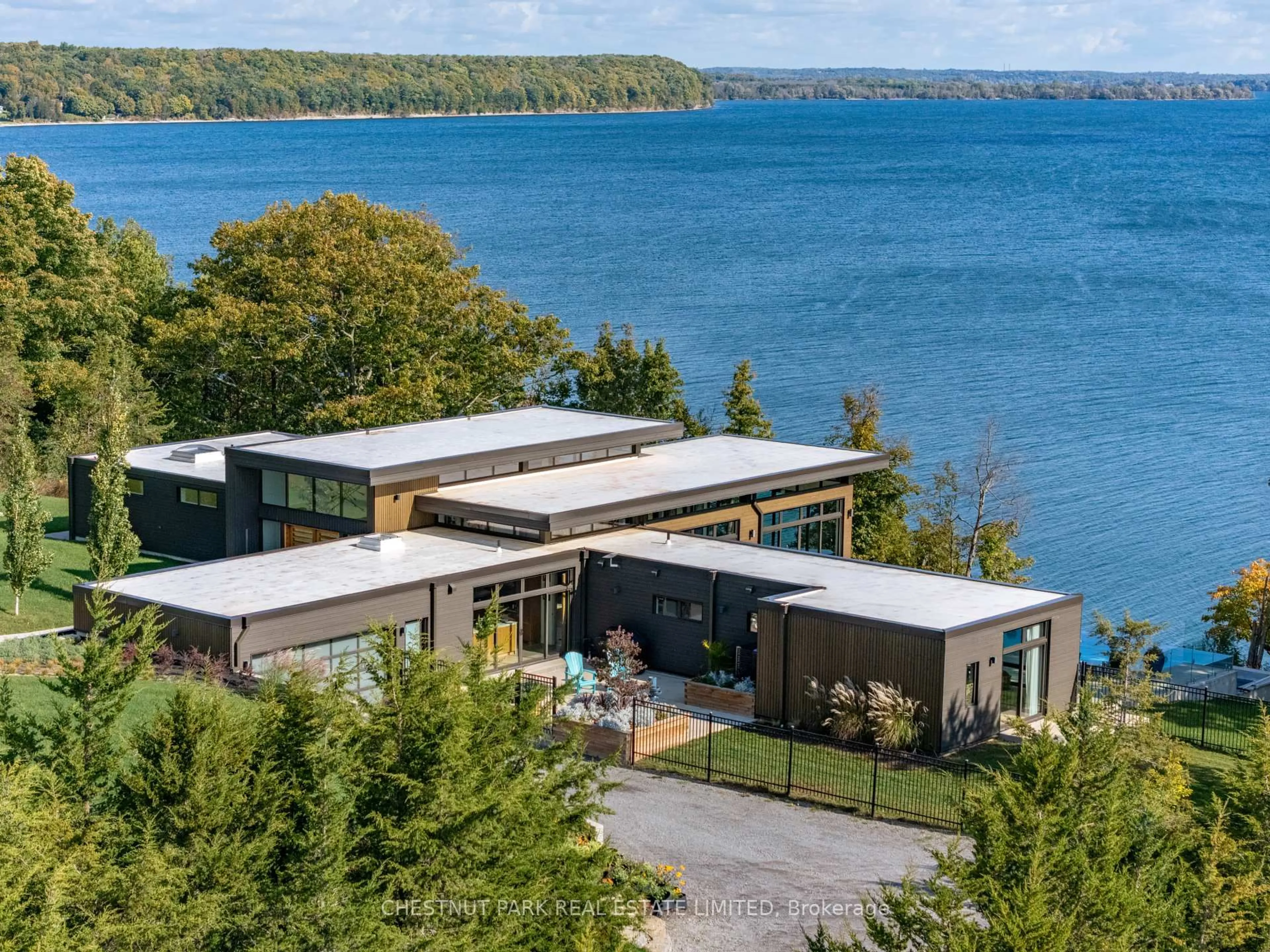 A pic from outside/outdoor area/front of a property/back of a property/a pic from drone, water/lake/river/ocean view for 1641 County Road 13 N/A, Prince Edward County Ontario K0K 2P0