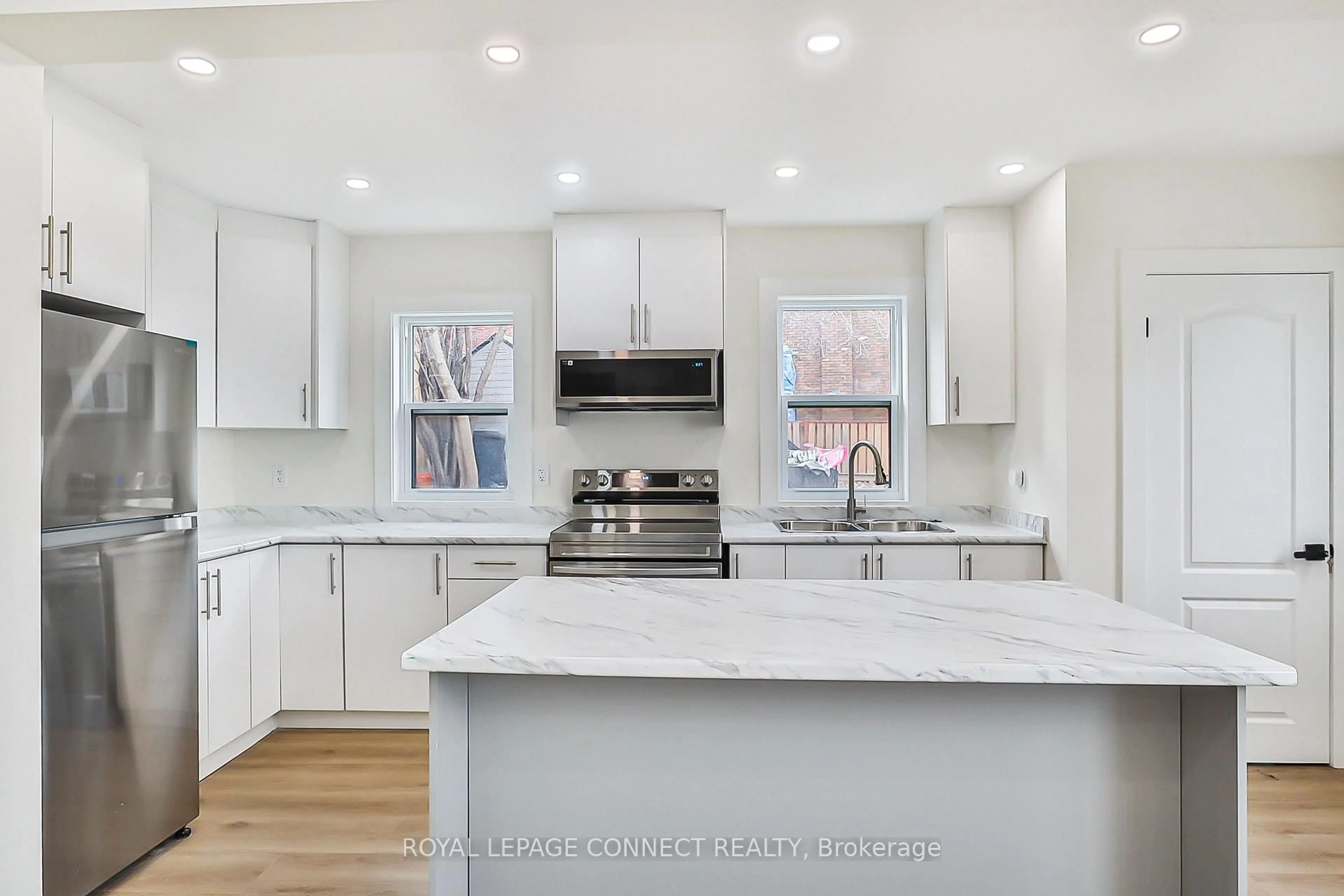 Open concept kitchen, ceramic/tile floor for 761 Guelph St, Kitchener Ontario N2H 5Z2