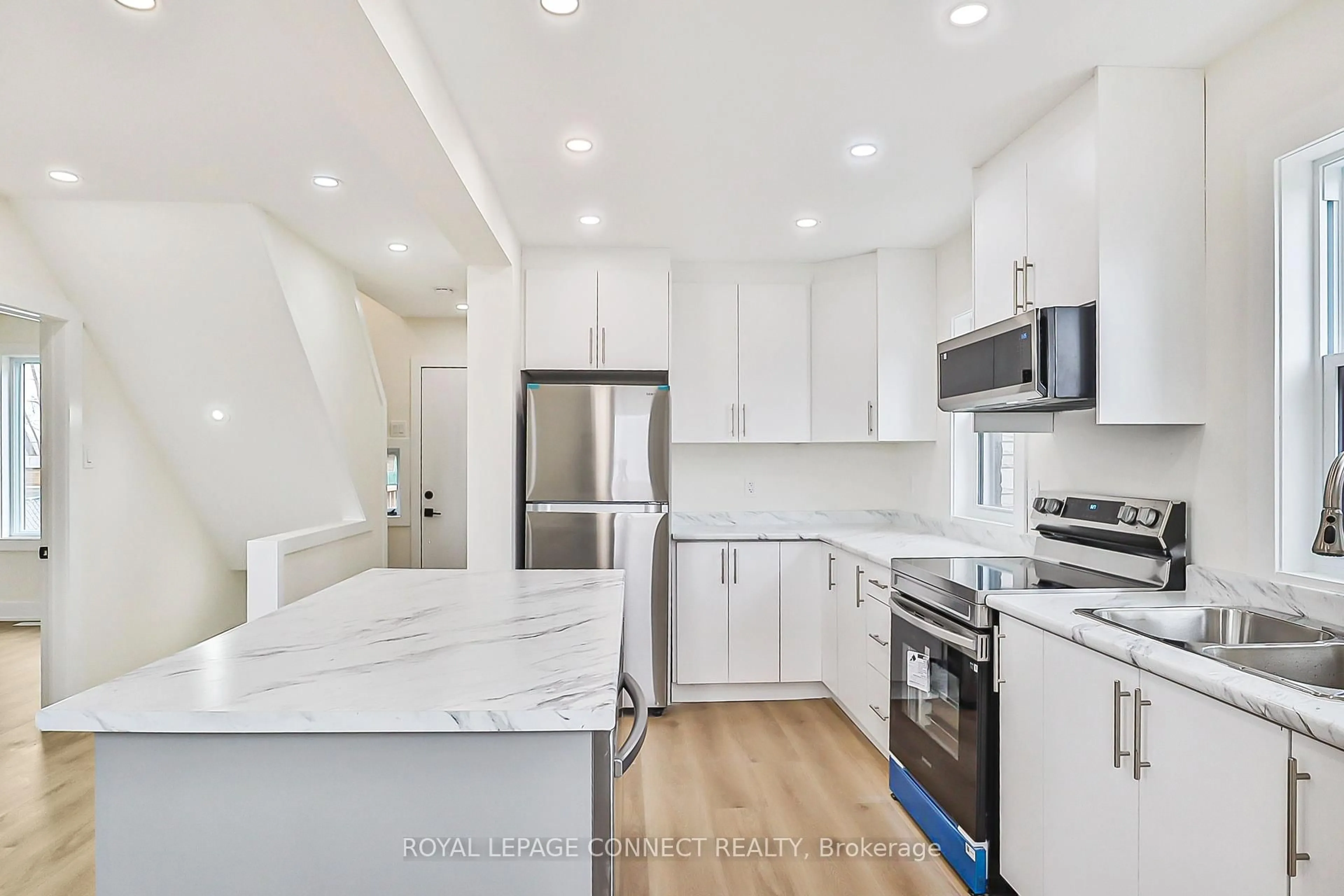 Open concept kitchen, ceramic/tile floor for 761 Guelph St, Kitchener Ontario N2H 5Z2