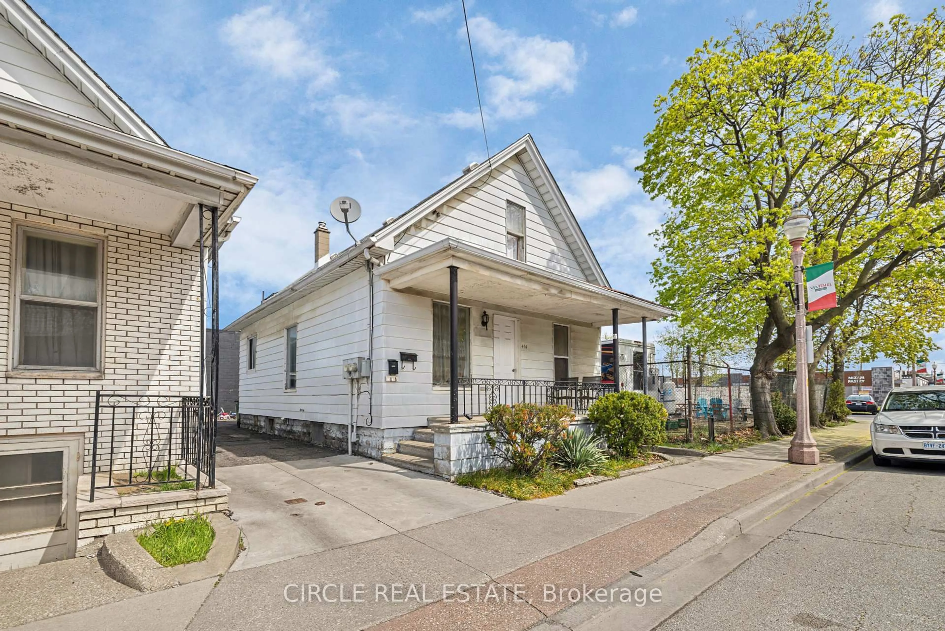 A pic from outside/outdoor area/front of a property/back of a property/a pic from drone, street for 416 Erie St, Windsor Ontario N9A 3X4