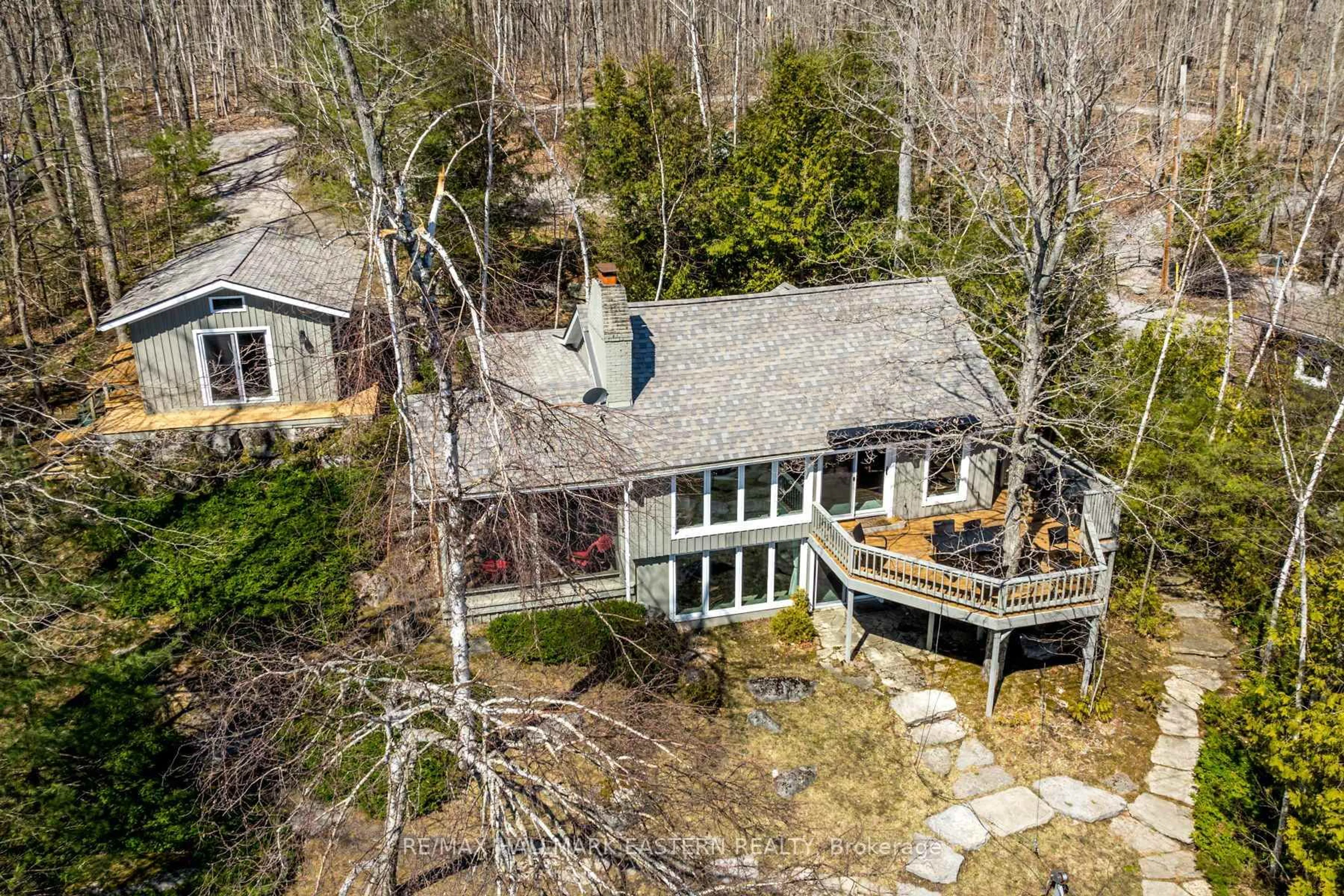 A pic from outside/outdoor area/front of a property/back of a property/a pic from drone, water/lake/river/ocean view for 2931 Pearson Lane, Selwyn Ontario K0L 2H0