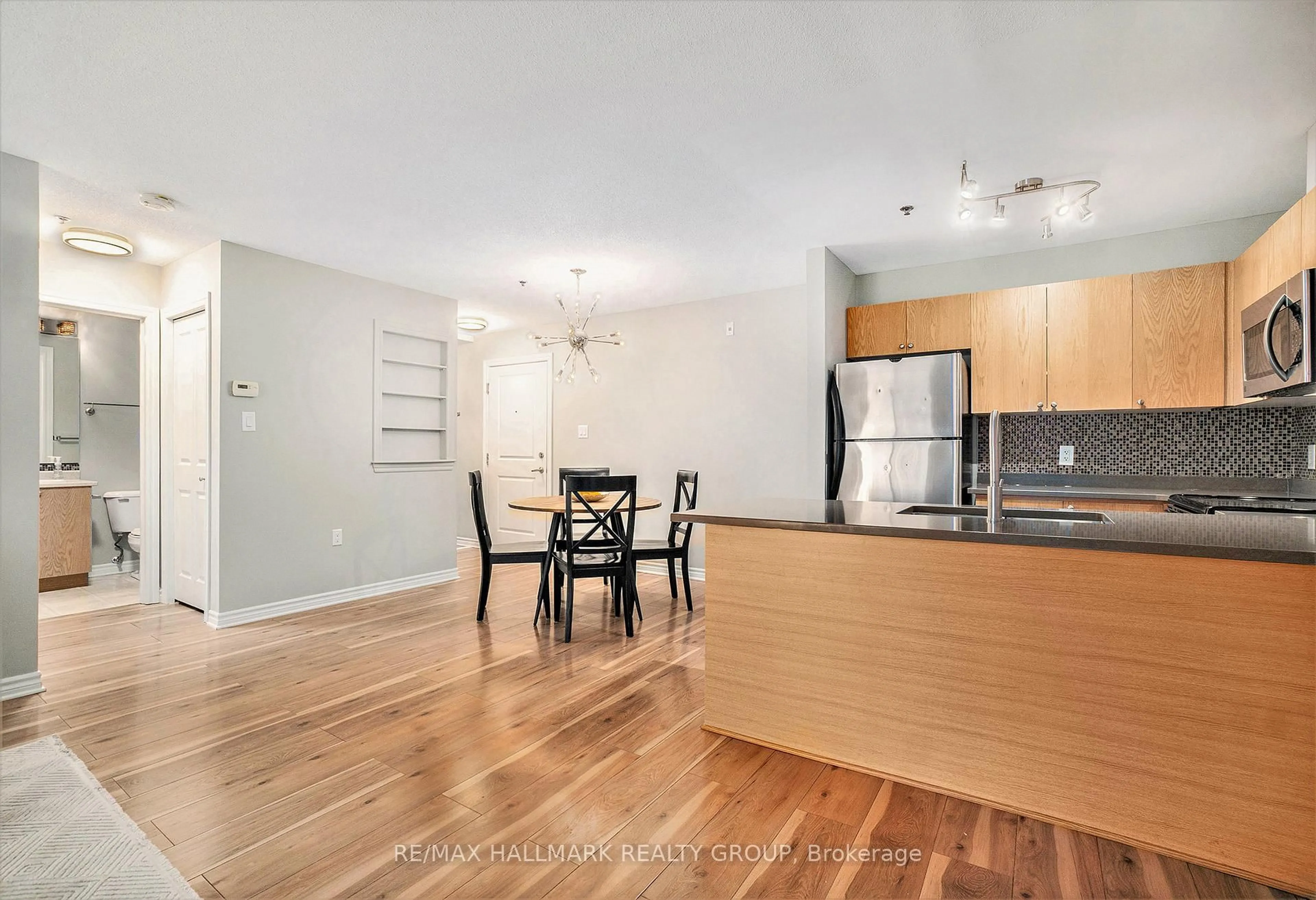 Open concept kitchen, wood/laminate floor for 151 Potts Private #211, Ottawa Ontario K4A 0V7