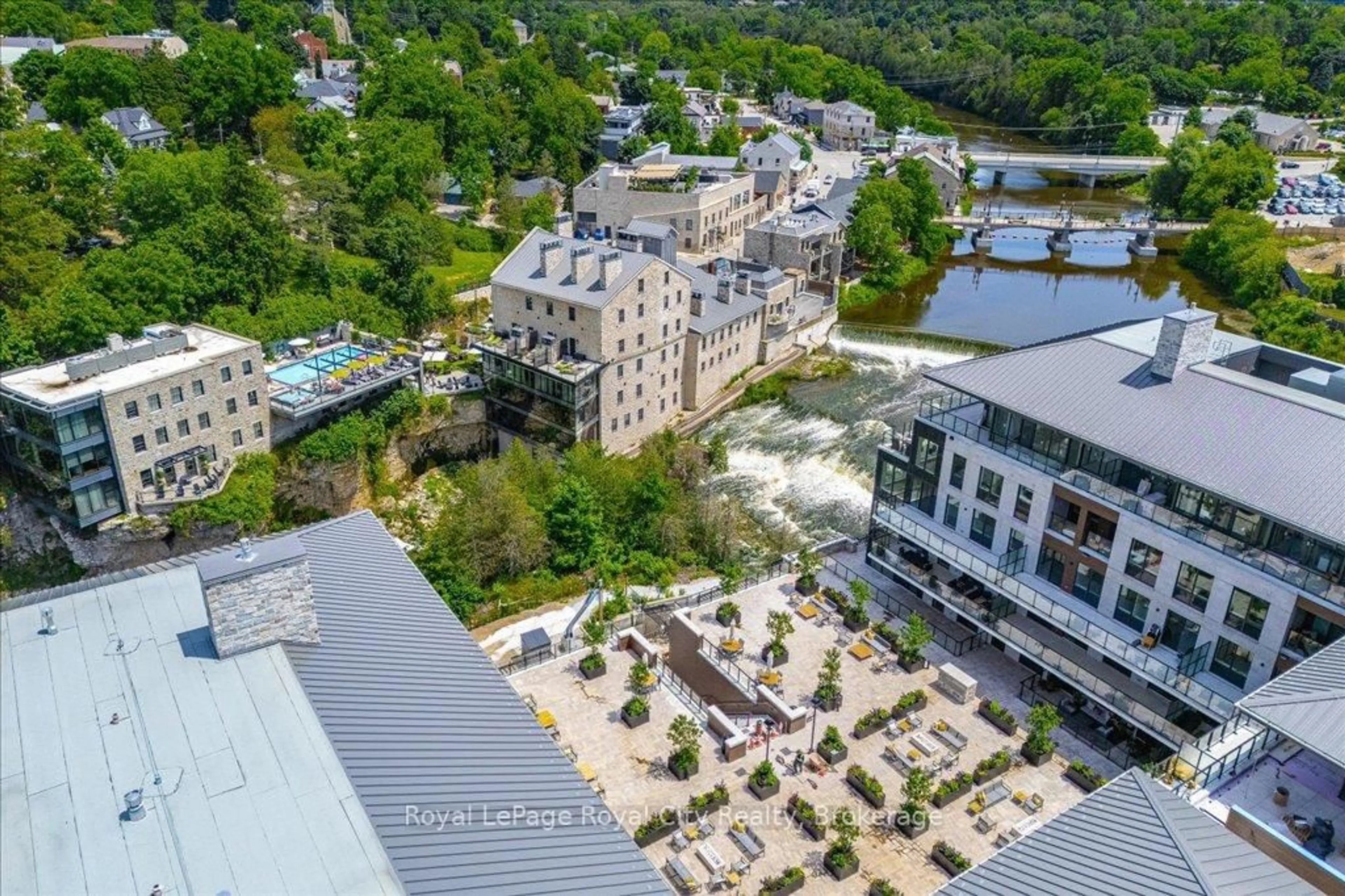 A pic from outside/outdoor area/front of a property/back of a property/a pic from drone, city buildings view from balcony for 6523 Wellington 7 Rd #25, Centre Wellington Ontario N0B 1S0
