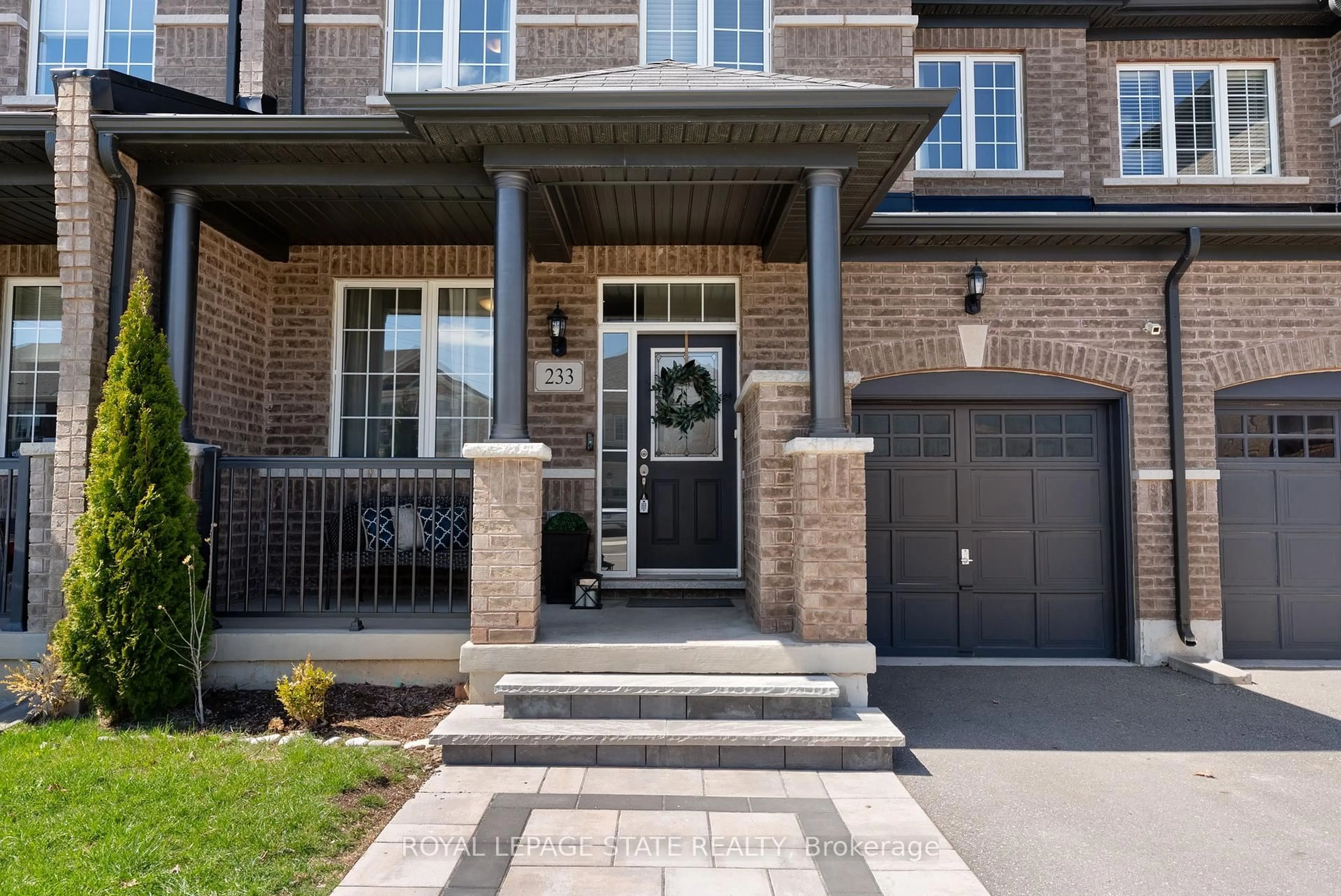 Home with brick exterior material, street for 233 Skinner Rd, Hamilton Ontario L8B 1X2