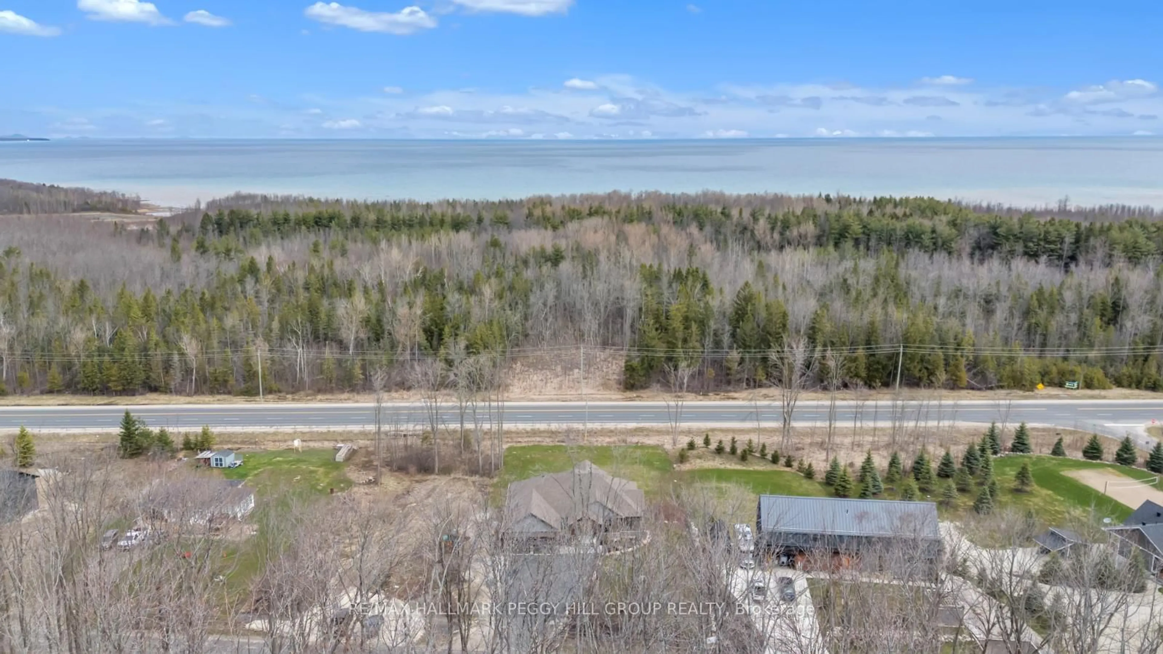 A pic from outside/outdoor area/front of a property/back of a property/a pic from drone, water/lake/river/ocean view for 135 Old Highway 26 Cres, Meaford Ontario N4L 1W7