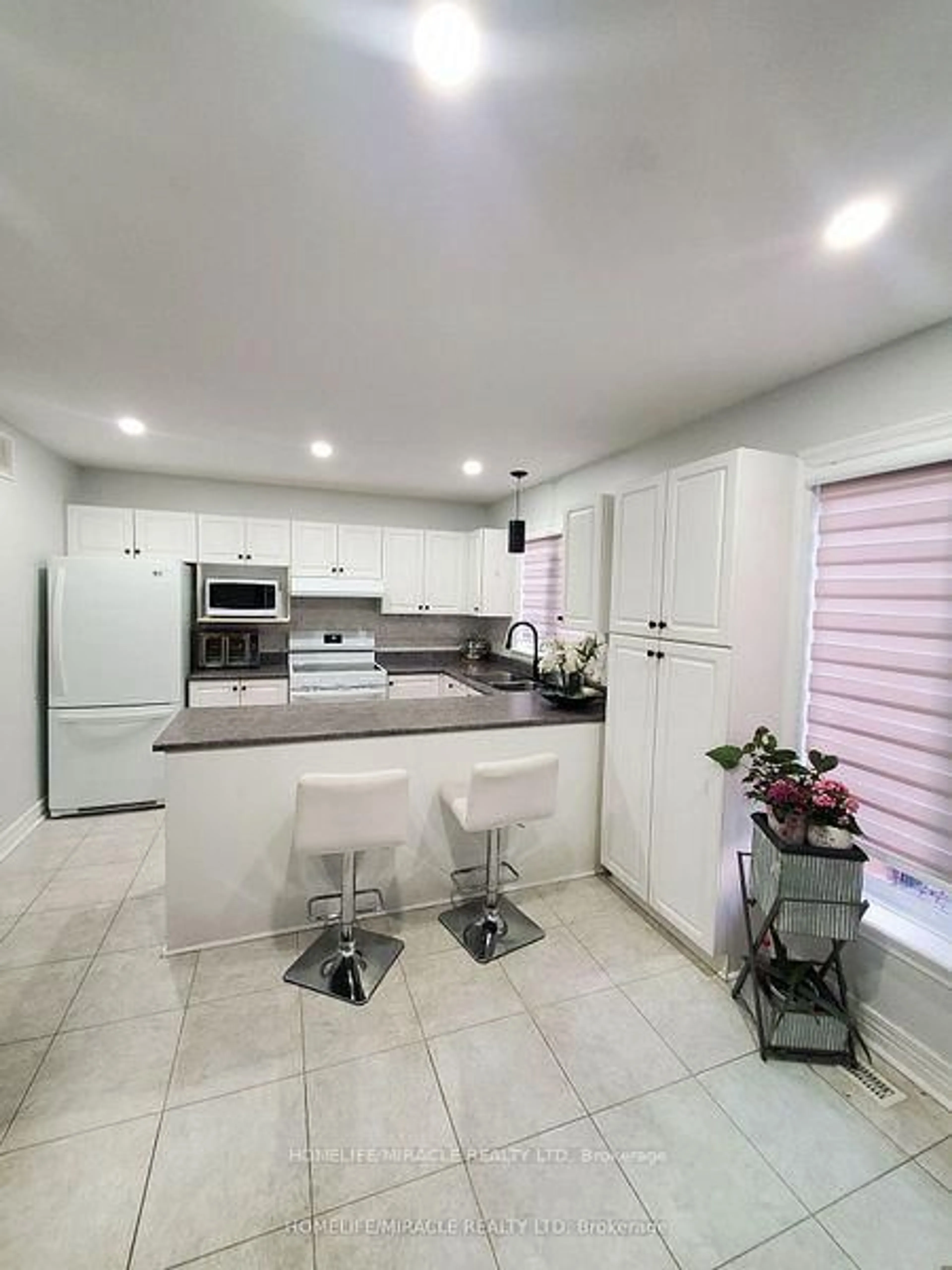 Open concept kitchen, ceramic/tile floor for 106 Knudson Dr, Ottawa Ontario K2K 2L5