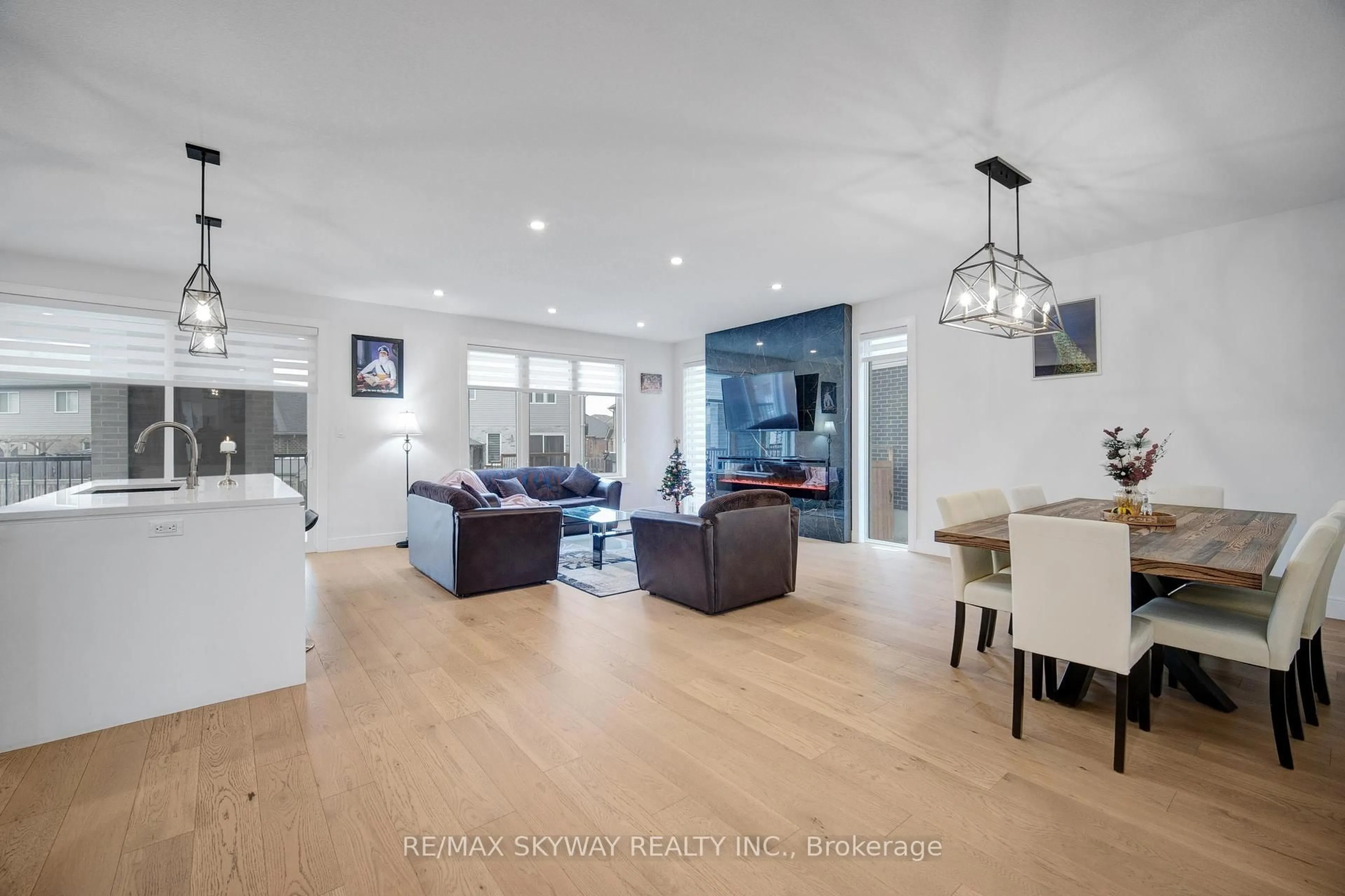 Open concept kitchen, wood/laminate floor for 3314 David Milne Way, London South Ontario N6L 1K3