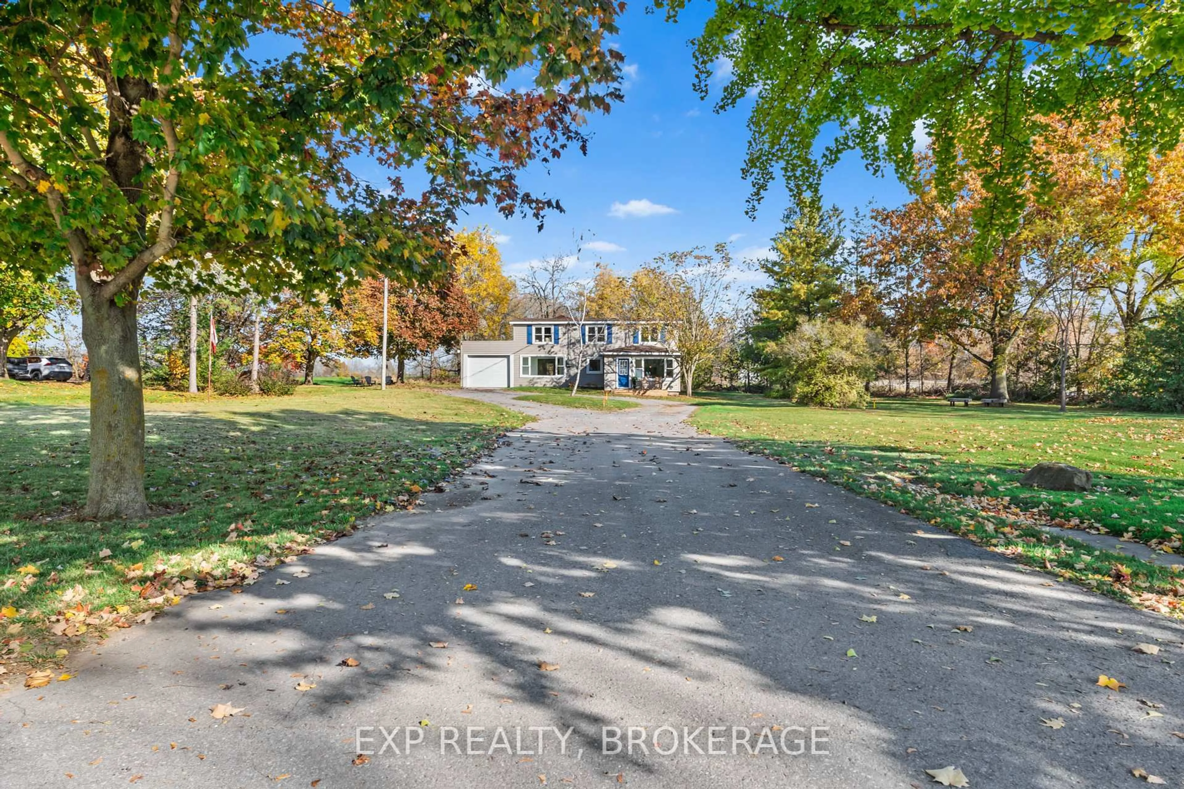 A pic from outside/outdoor area/front of a property/back of a property/a pic from drone, street for 412 BLOOMFIELD MAIN St, Prince Edward County Ontario K0K 1G0