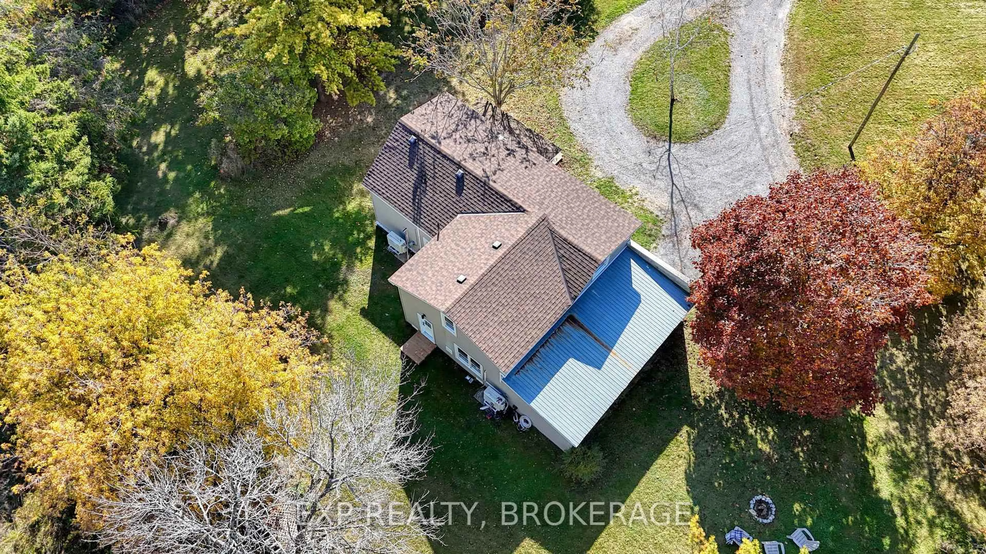 A pic from outside/outdoor area/front of a property/back of a property/a pic from drone, street for 412 BLOOMFIELD MAIN St, Prince Edward County Ontario K0K 1G0