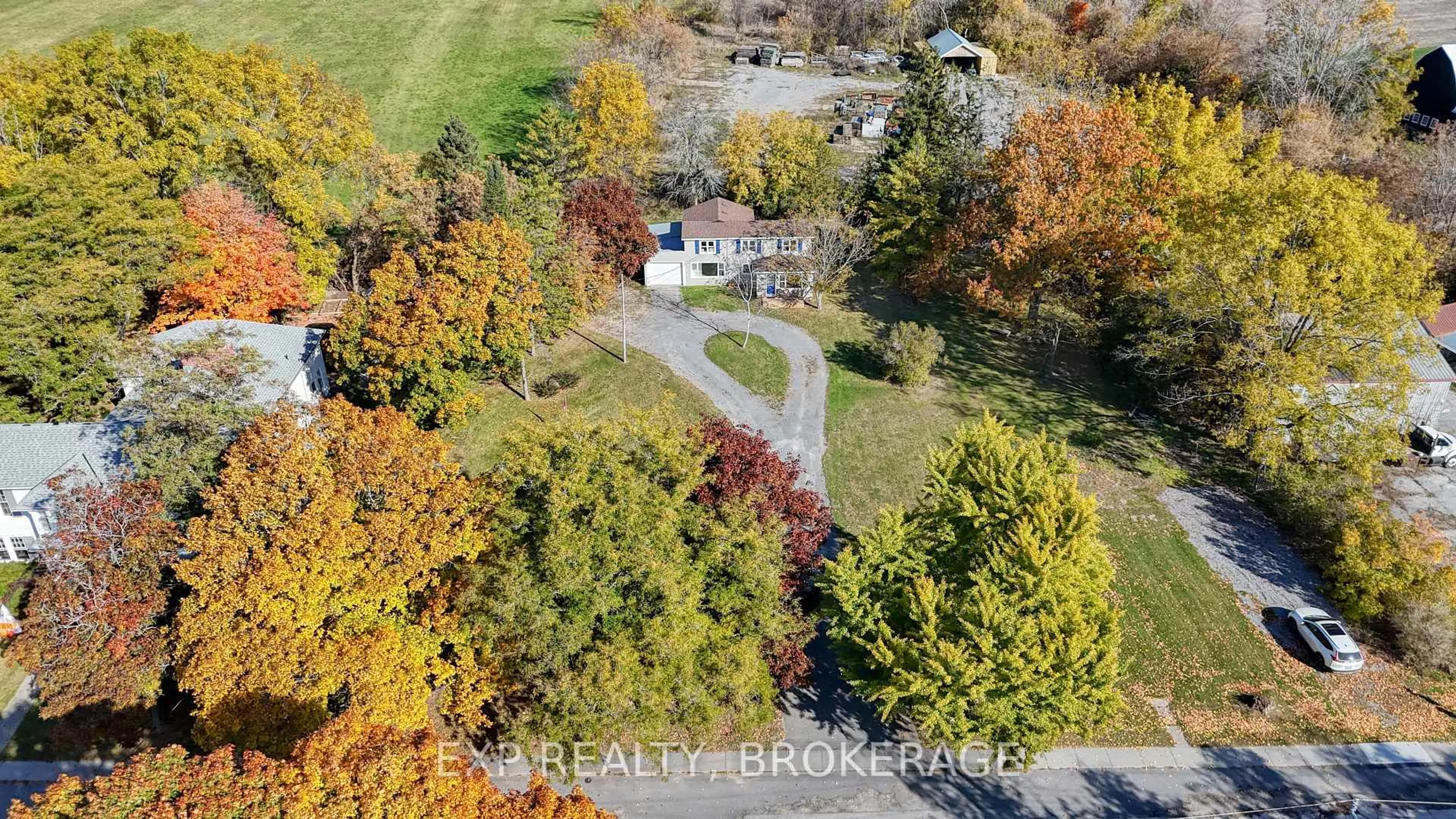 A pic from outside/outdoor area/front of a property/back of a property/a pic from drone, street for 412 BLOOMFIELD MAIN St, Prince Edward County Ontario K0K 1G0