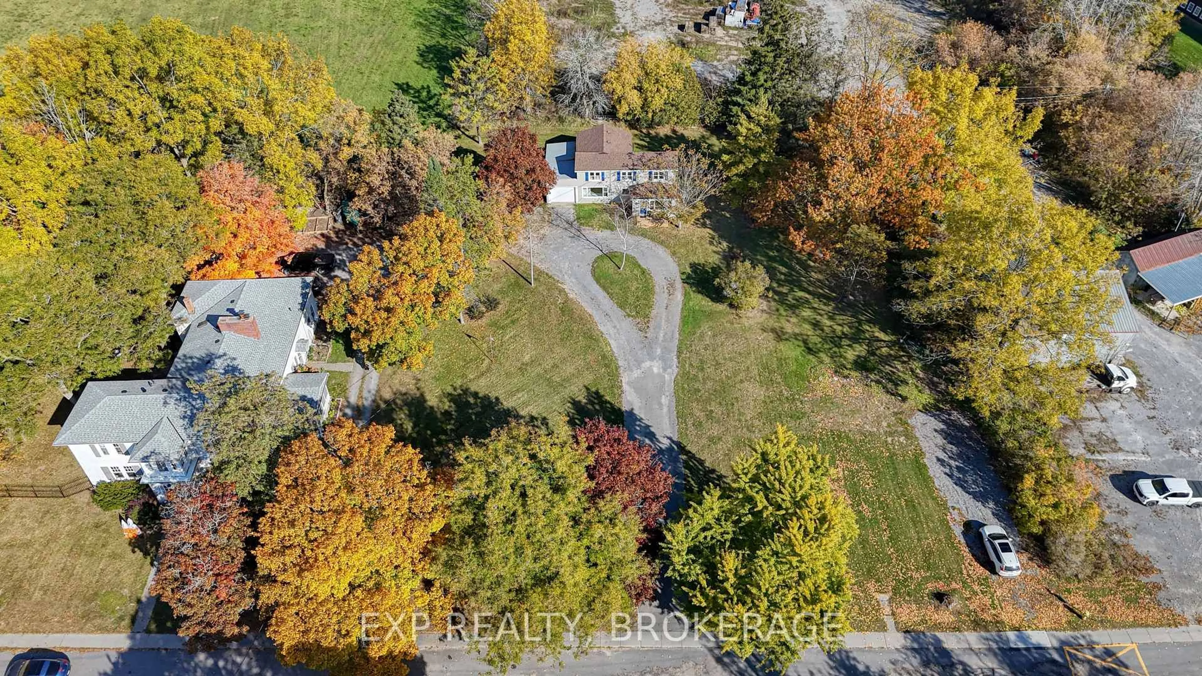 A pic from outside/outdoor area/front of a property/back of a property/a pic from drone, street for 412 BLOOMFIELD MAIN St, Prince Edward County Ontario K0K 1G0