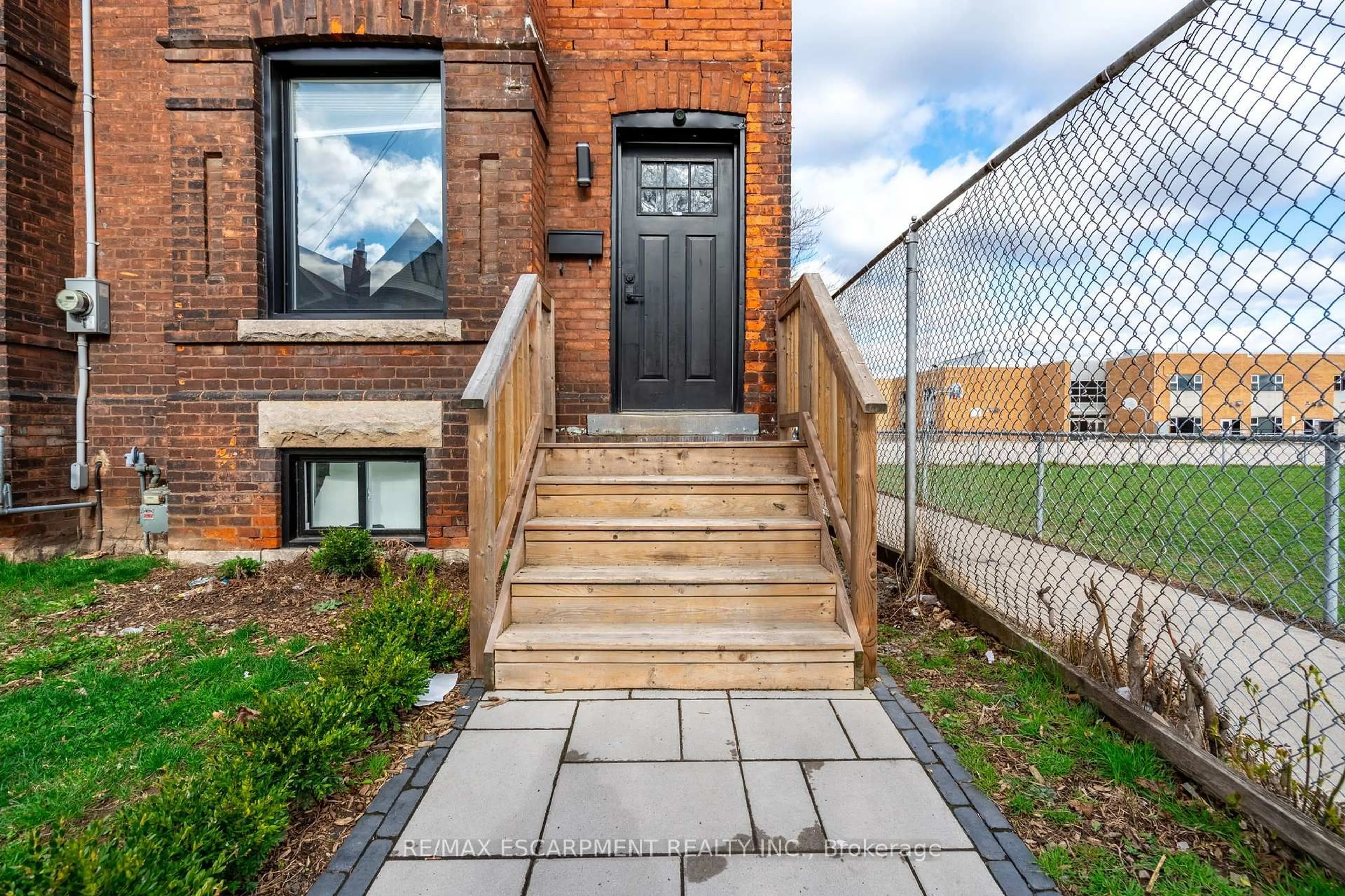 Home with brick exterior material, street for 57 Madison Ave, Hamilton Ontario L8L 5Y5