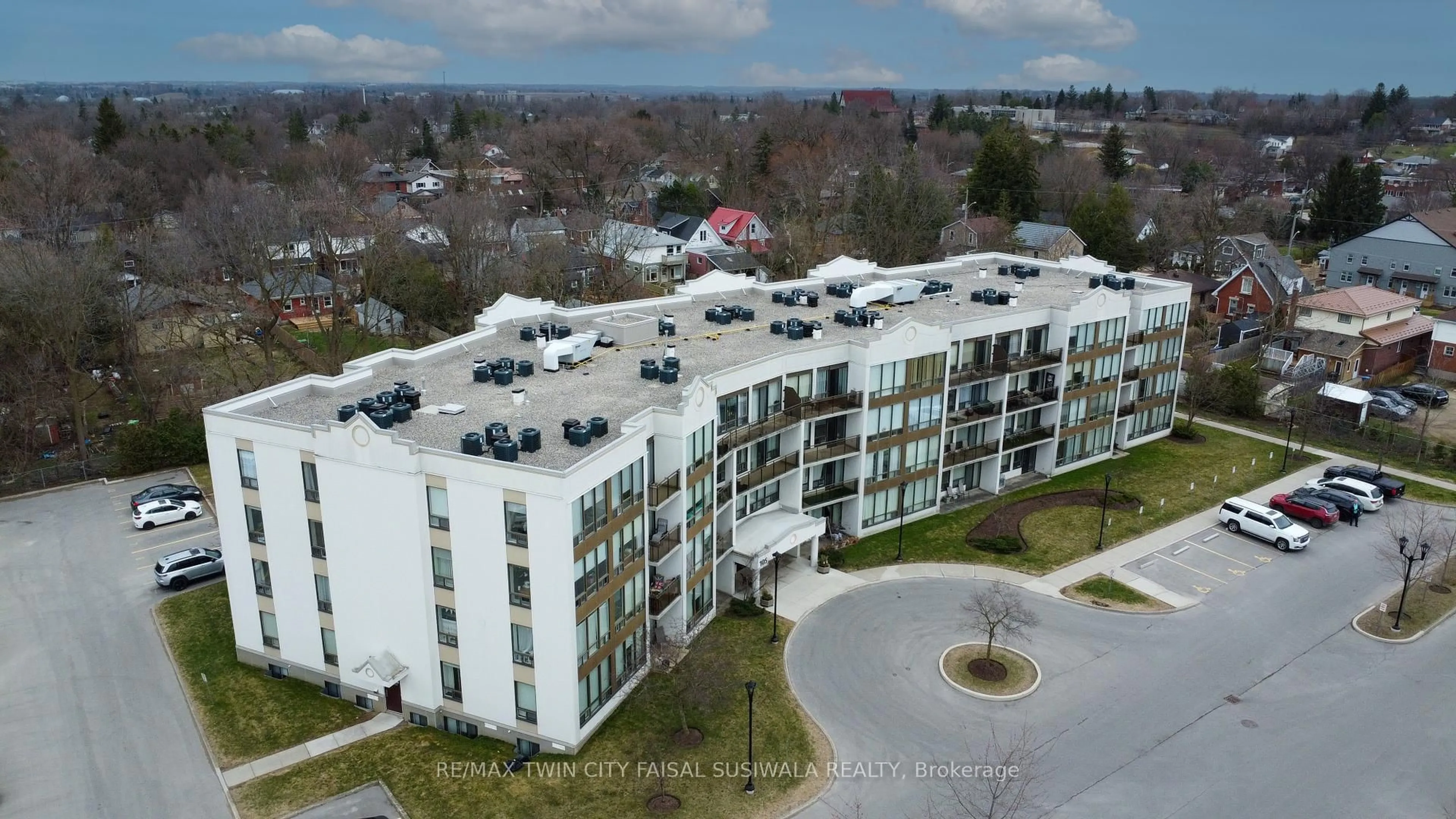 A pic from outside/outdoor area/front of a property/back of a property/a pic from drone, unknown for 105 Bagot St #208, Guelph Ontario N1H 8H4