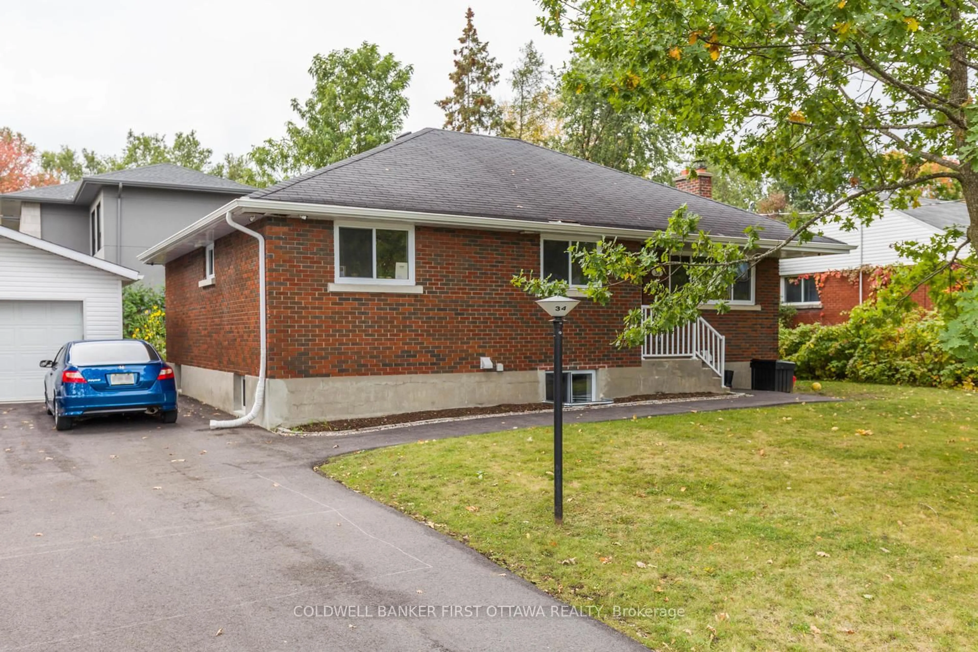 Home with brick exterior material, street for 34 WESTWOOD Dr, Ottawa Ontario K2G 2X1