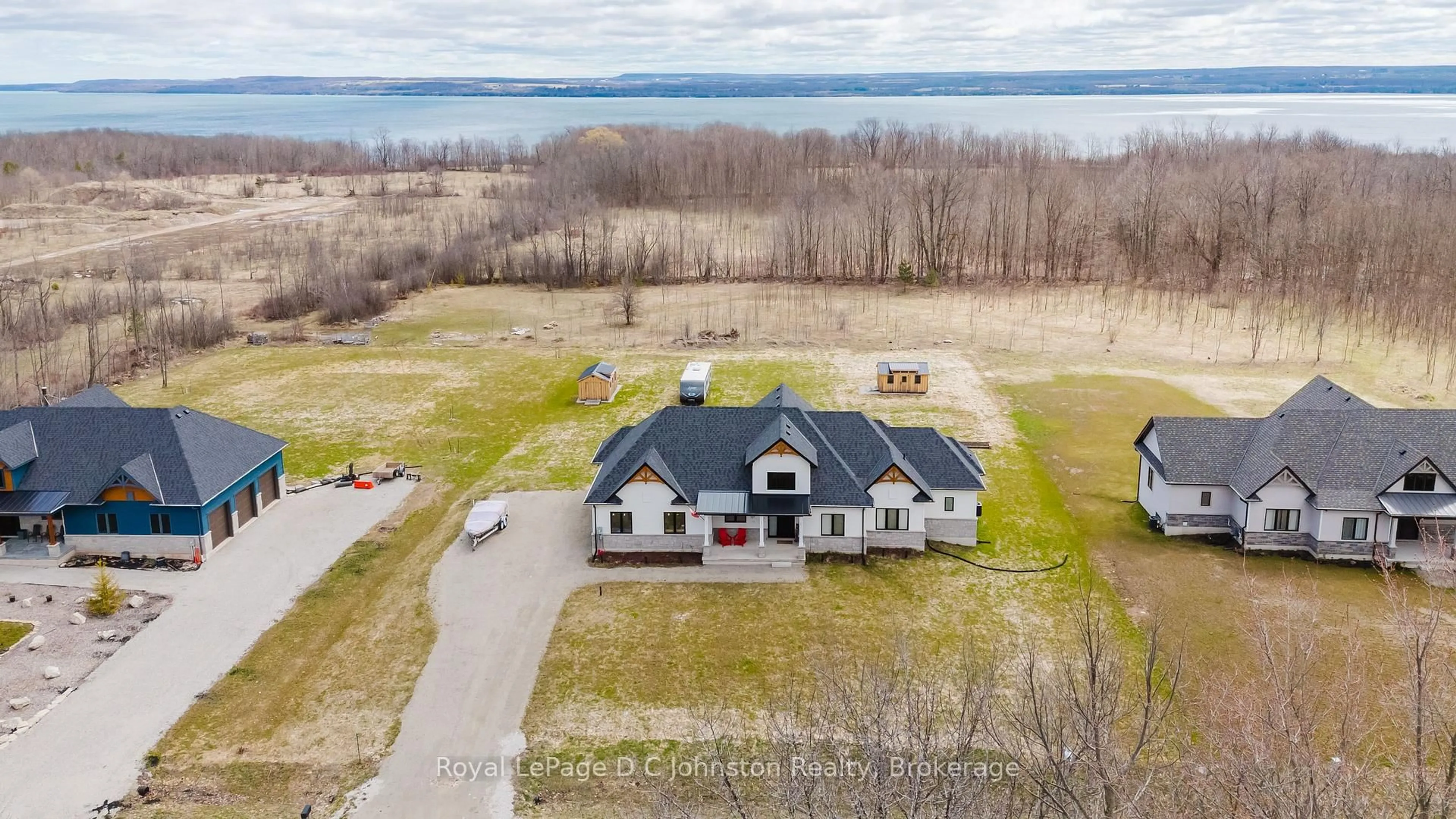 A pic from outside/outdoor area/front of a property/back of a property/a pic from drone, water/lake/river/ocean view for 167 Alexandria St, Georgian Bluffs Ontario N4K 0G2
