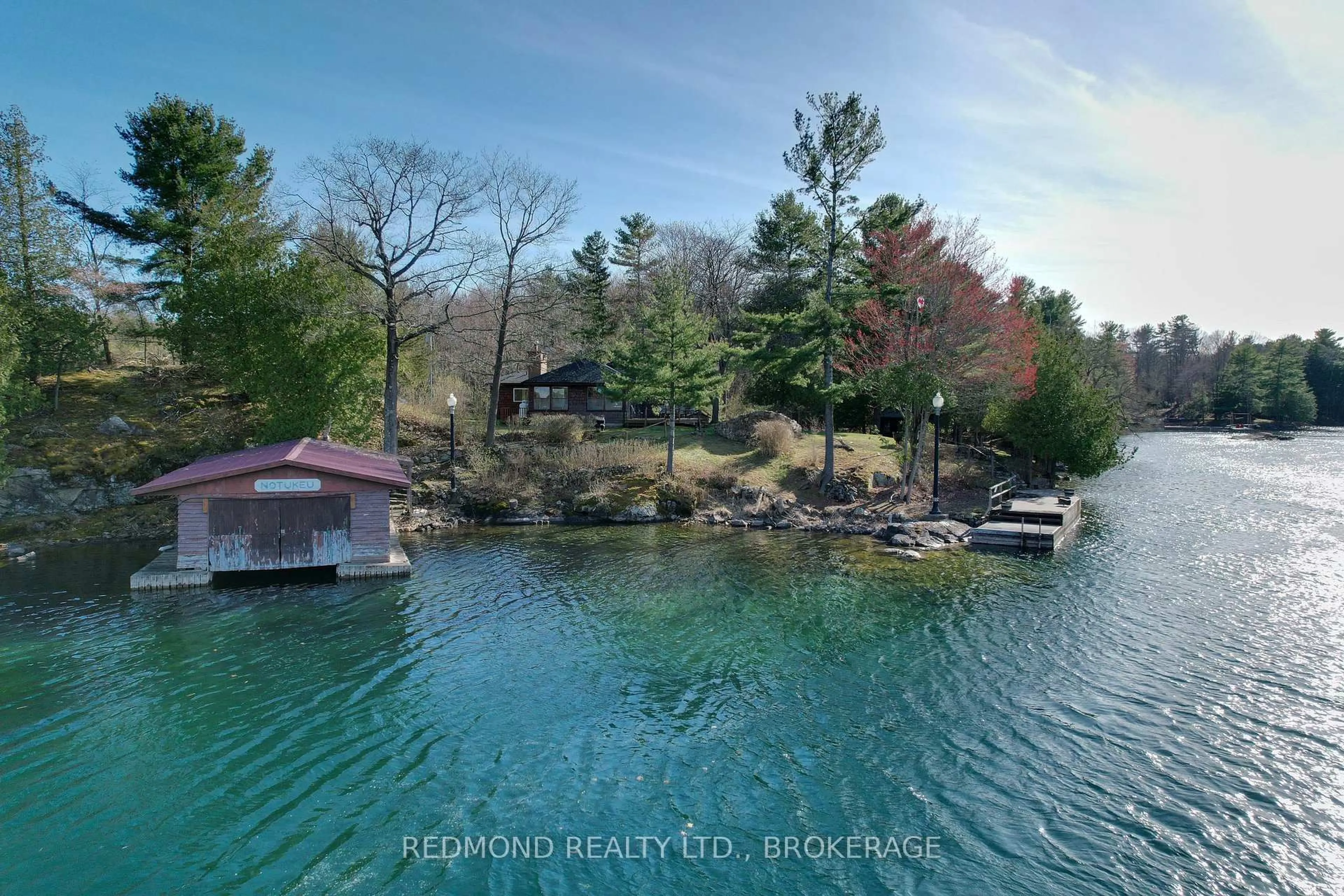 A pic from outside/outdoor area/front of a property/back of a property/a pic from drone, water/lake/river/ocean view for 112 Shady Lane, Lansdowne Ontario K0E 1L0