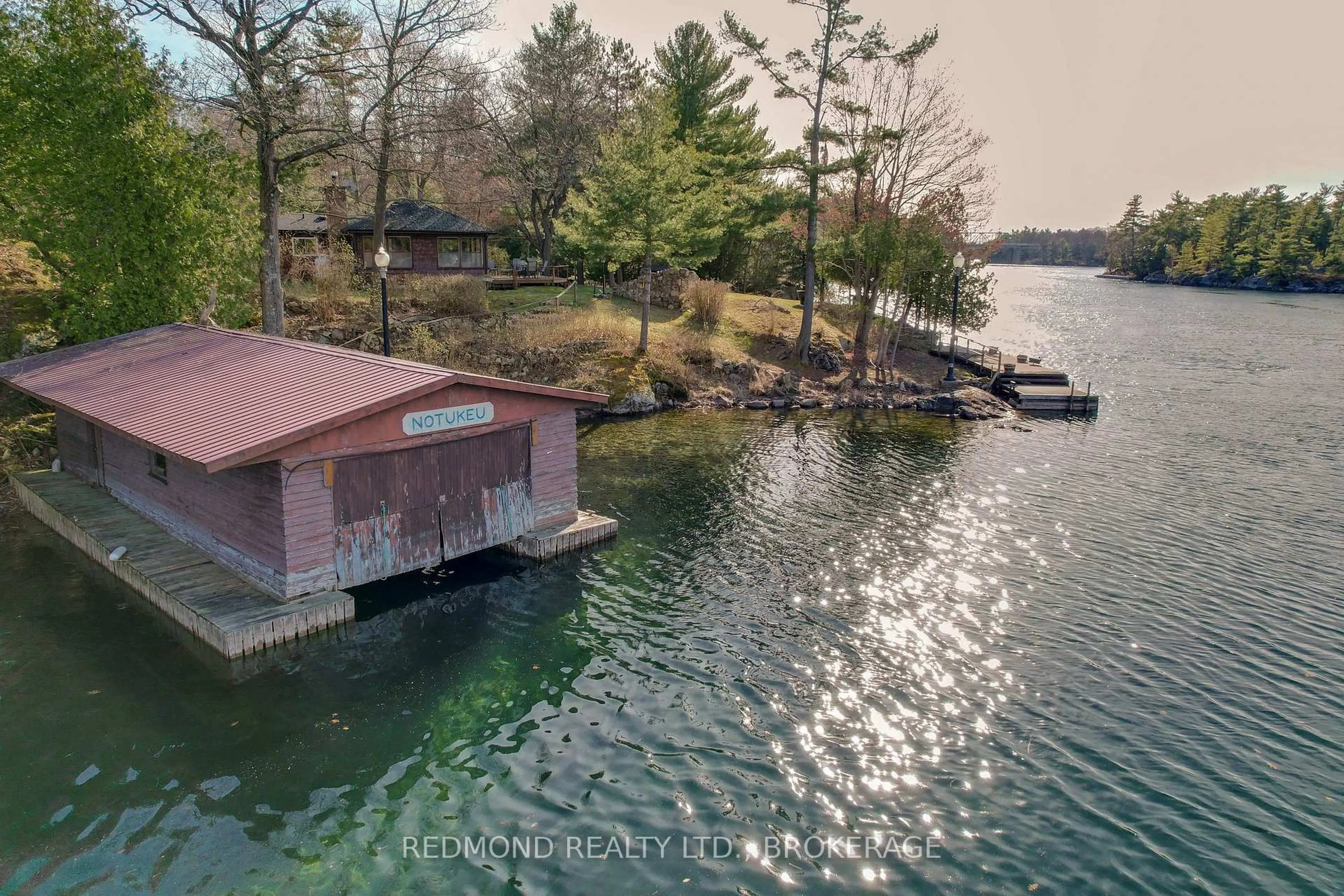 A pic from outside/outdoor area/front of a property/back of a property/a pic from drone, water/lake/river/ocean view for 112 Shady Lane, Lansdowne Ontario K0E 1L0
