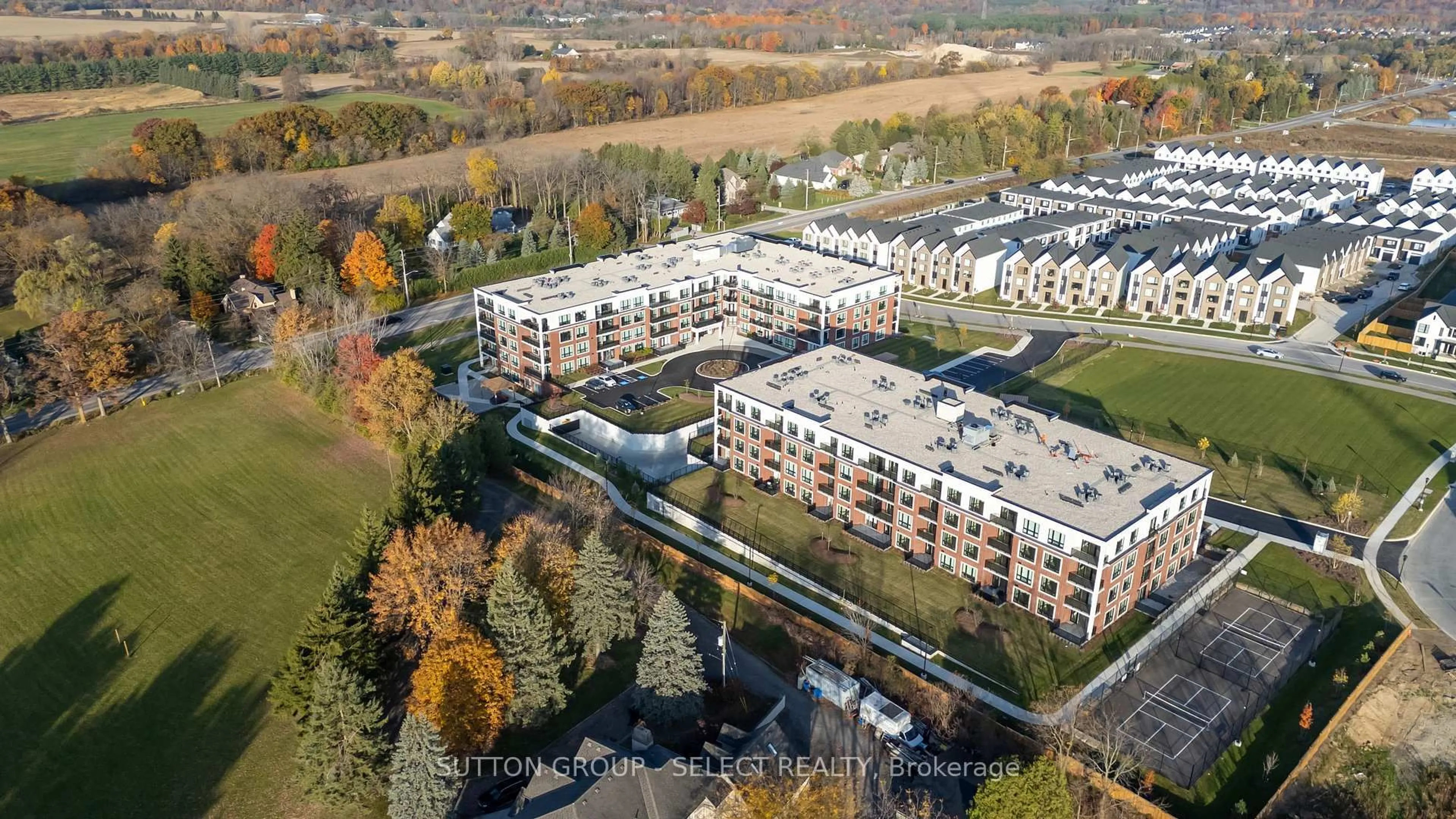 A pic from outside/outdoor area/front of a property/back of a property/a pic from drone, city buildings view from balcony for 1975 Fountain Grass Dr #307, London South Ontario N6K 0M3