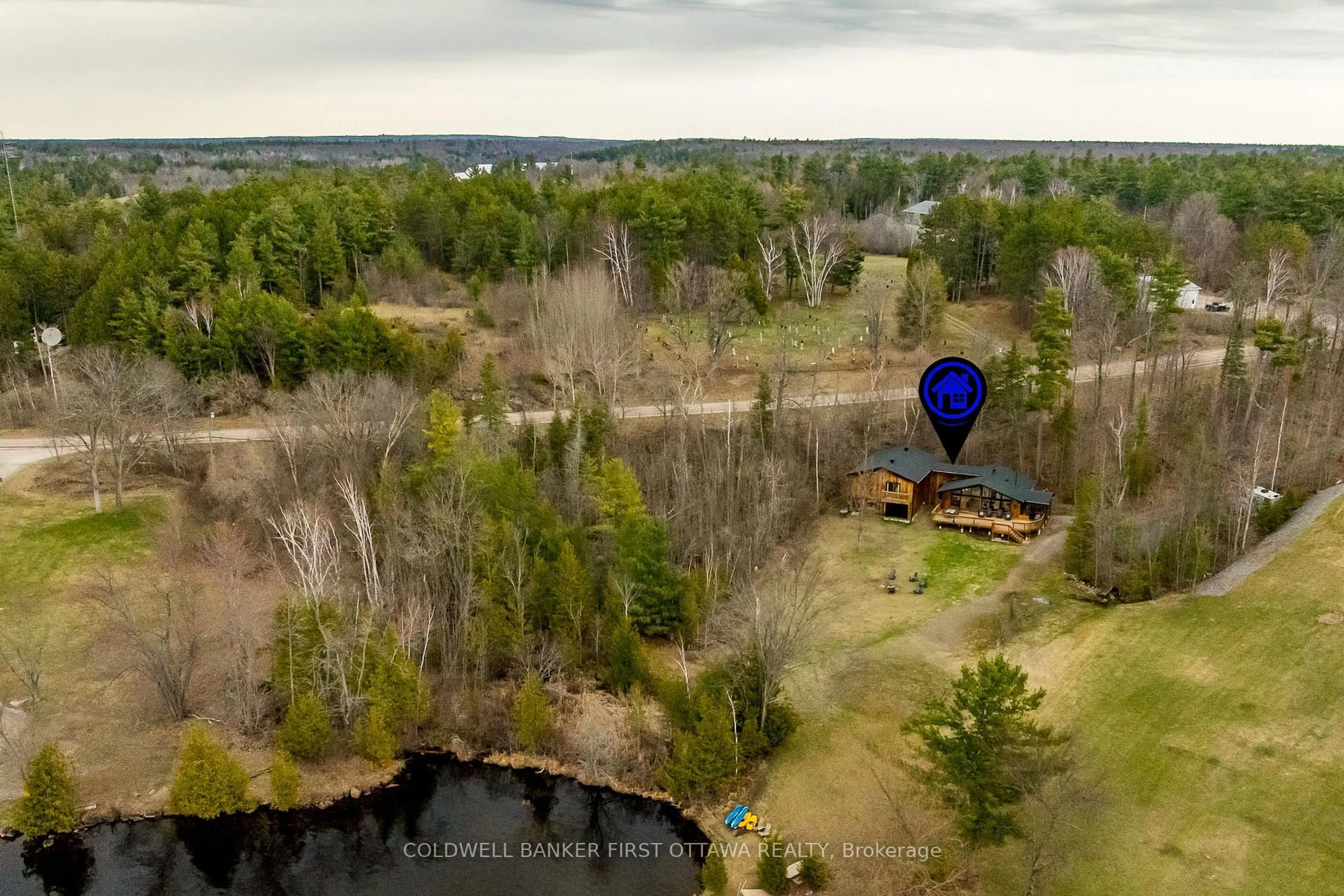 A pic from outside/outdoor area/front of a property/back of a property/a pic from drone, water/lake/river/ocean view for 6 BLUFF POINT Dr, Calabogie Ontario K0J 1H0