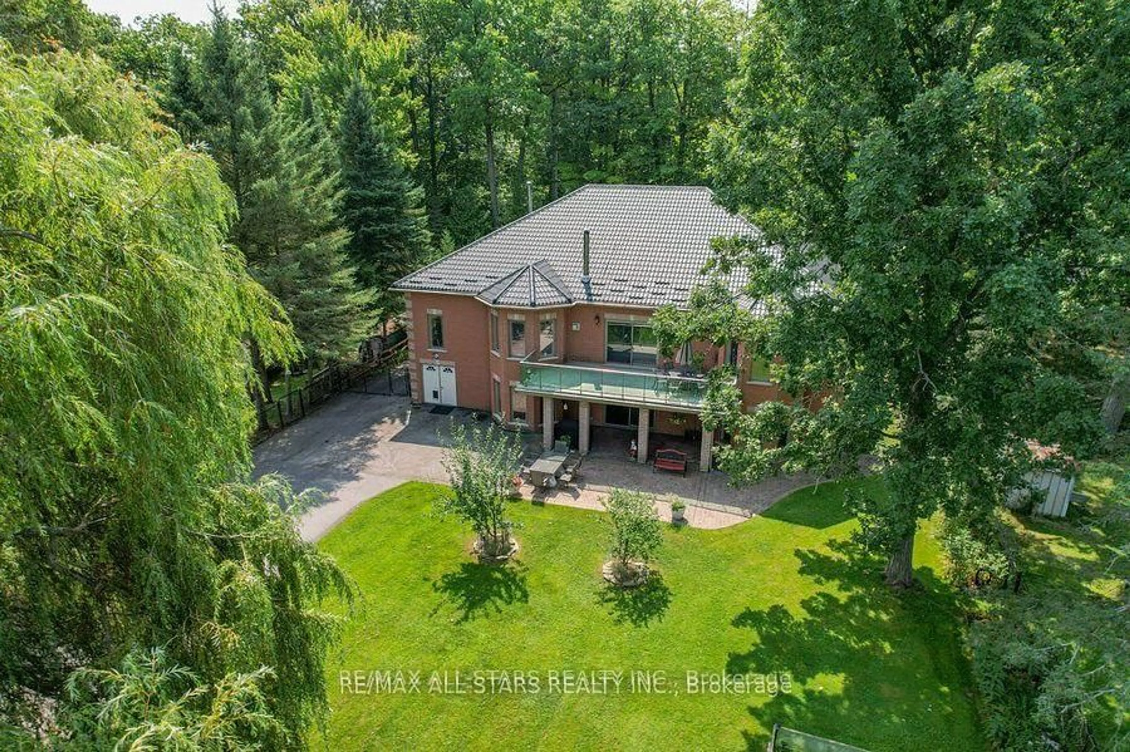 A pic from outside/outdoor area/front of a property/back of a property/a pic from drone, forest/trees view for 182 Charlore Park Dr, Kawartha Lakes Ontario K0L 2W0