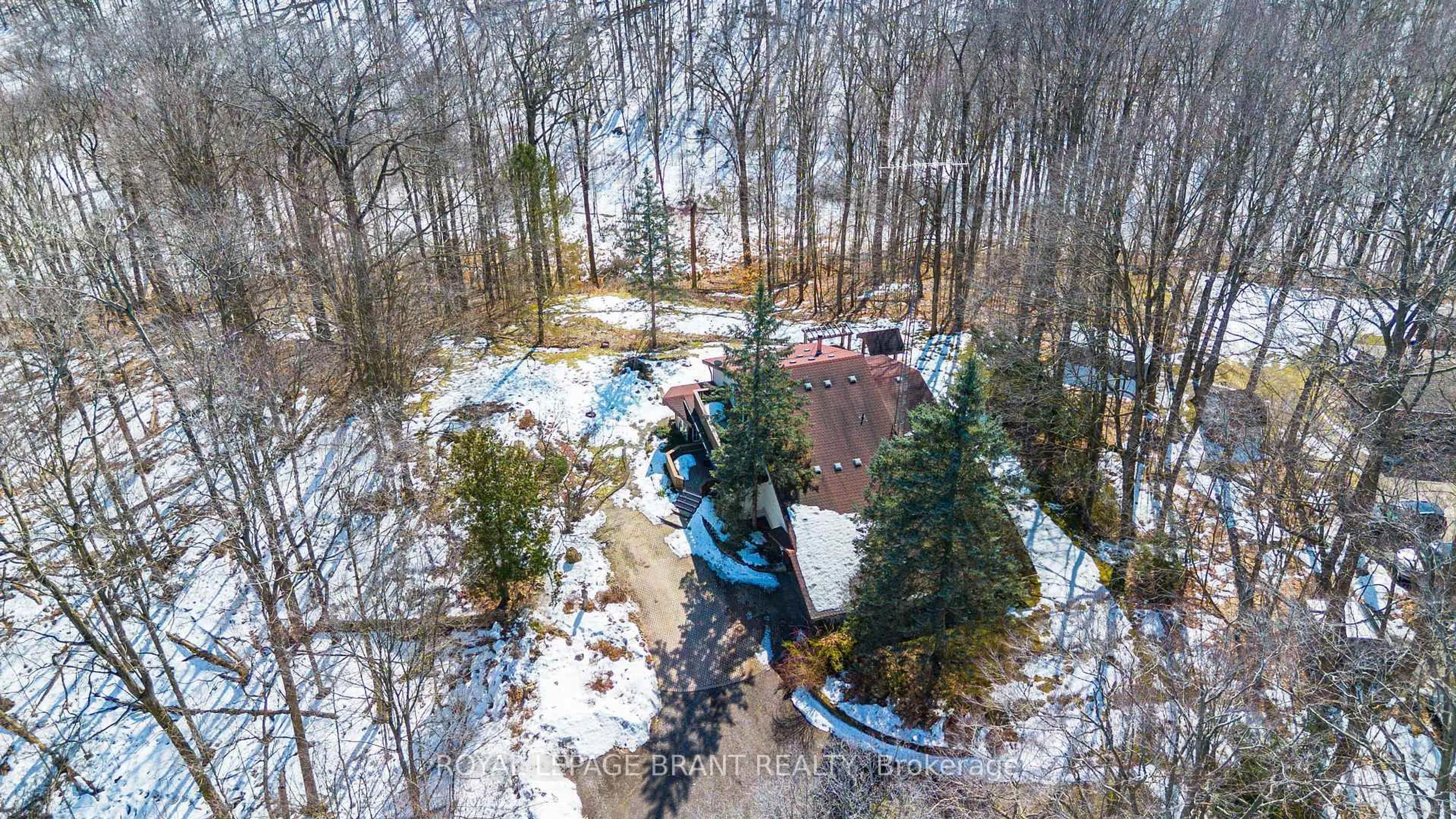 A pic from outside/outdoor area/front of a property/back of a property/a pic from drone, forest/trees view for 226 McLean School Rd, Brant Ontario N0E 1N0