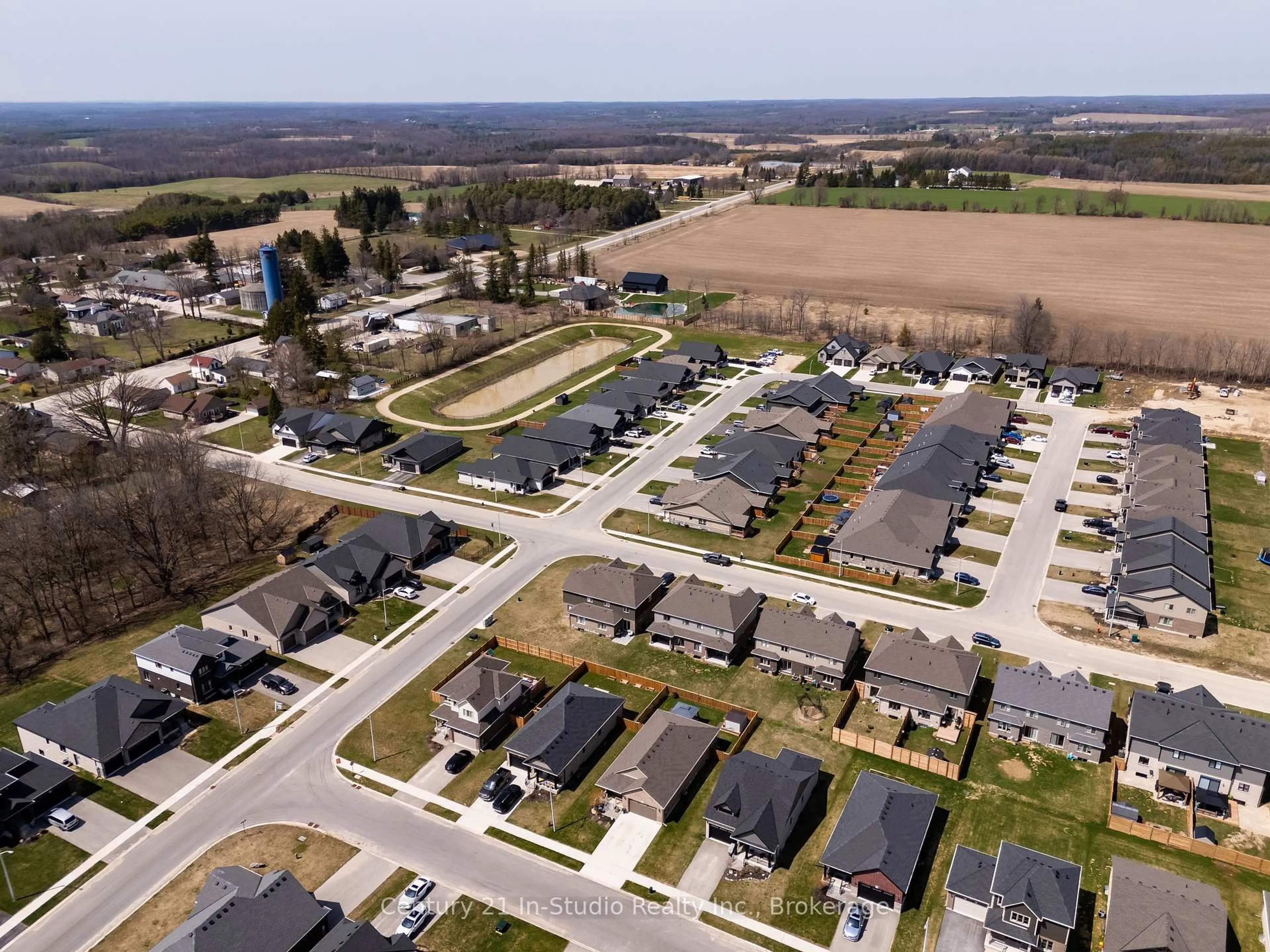 A pic from outside/outdoor area/front of a property/back of a property/a pic from drone, street for 104 Emerson Way, West Grey Ontario N0G 1R0