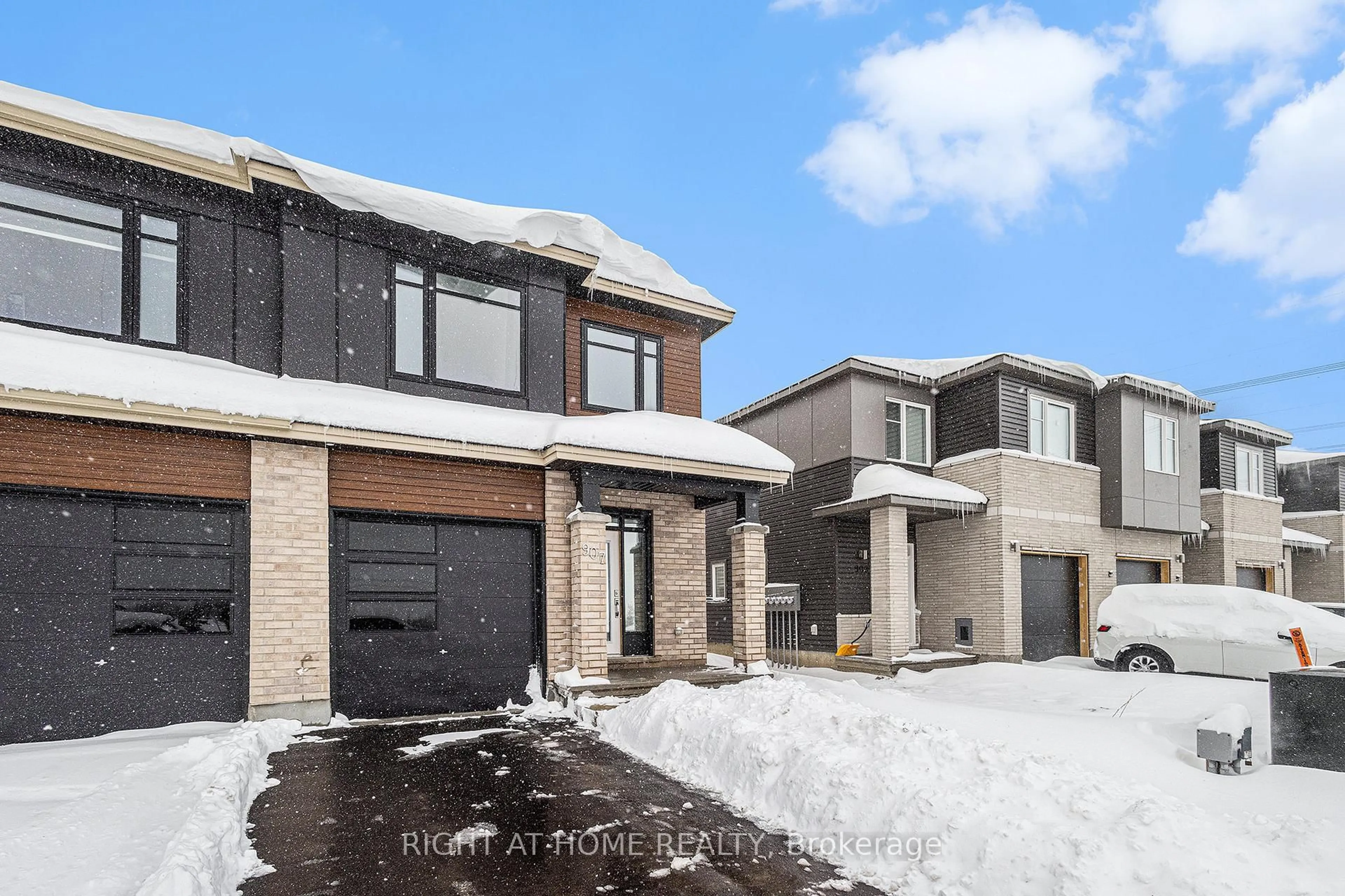 Home with brick exterior material, street for 907 Orvieto Way, Stittsville Ontario K2S 2L1