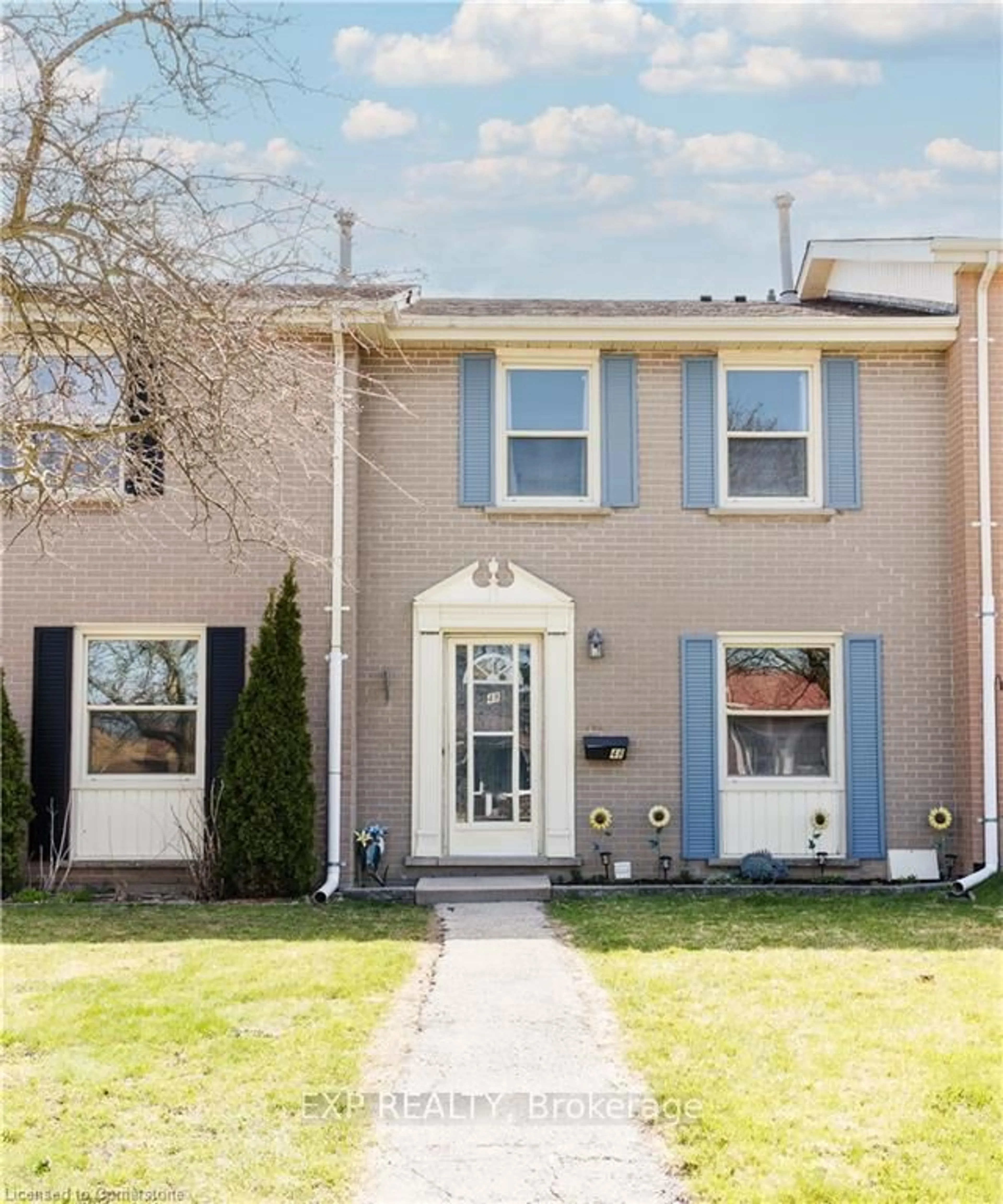 Home with brick exterior material, street for 48 Montcalm Dr #5, Kitchener Ontario N2B 2R1