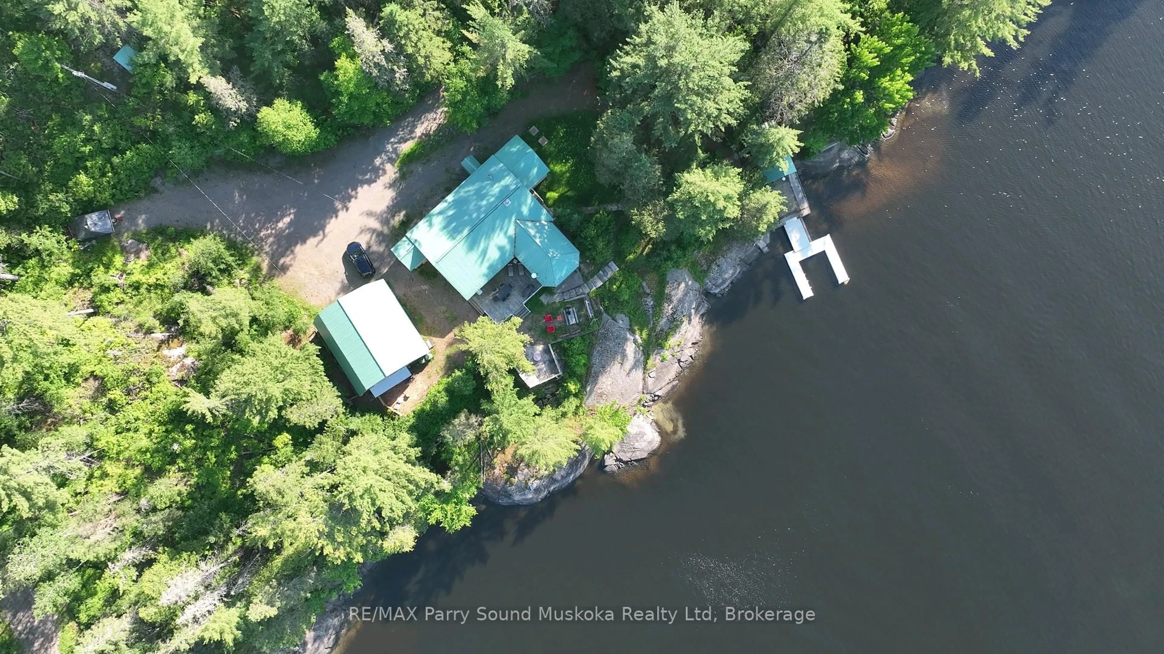 A pic from outside/outdoor area/front of a property/back of a property/a pic from drone, water/lake/river/ocean view for 667 Hwy 528A Highway, French River Ontario P0M 2K0