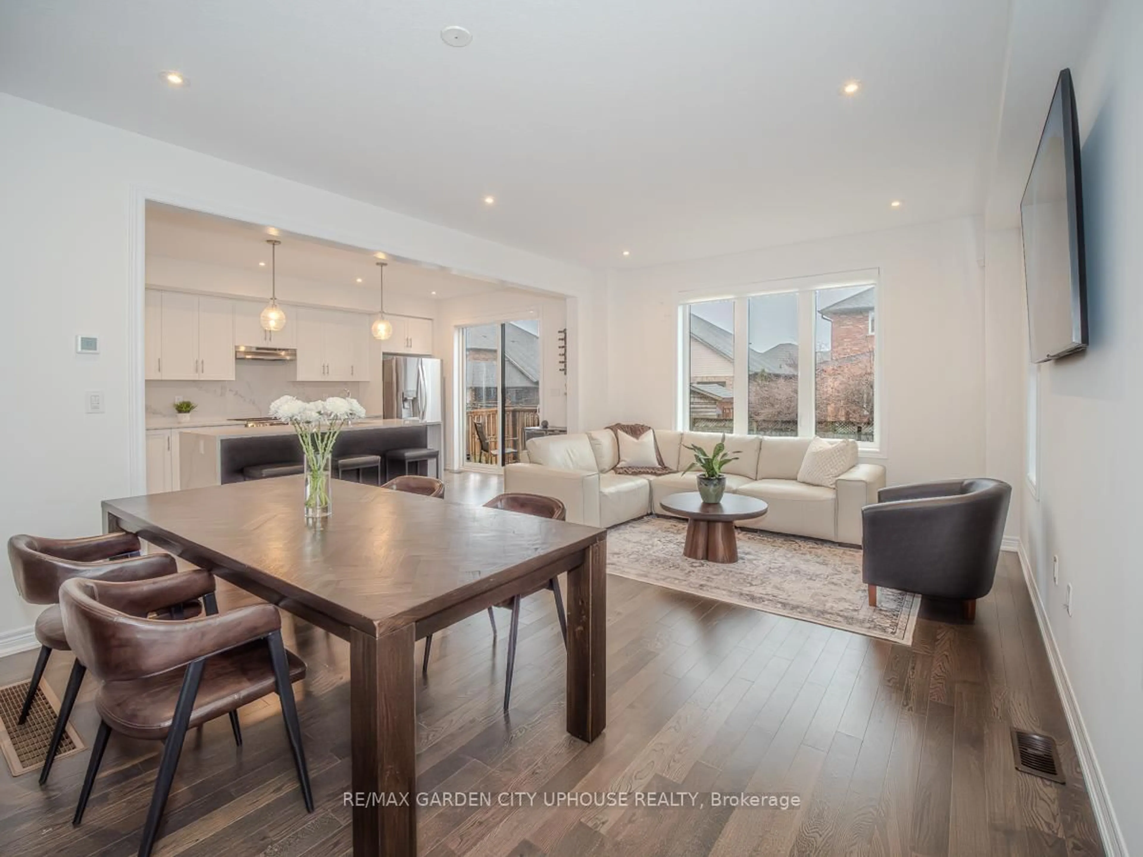 Open concept kitchen, wood/laminate floor for 111 STARFIRE Cres, Hamilton Ontario L8E 0K9