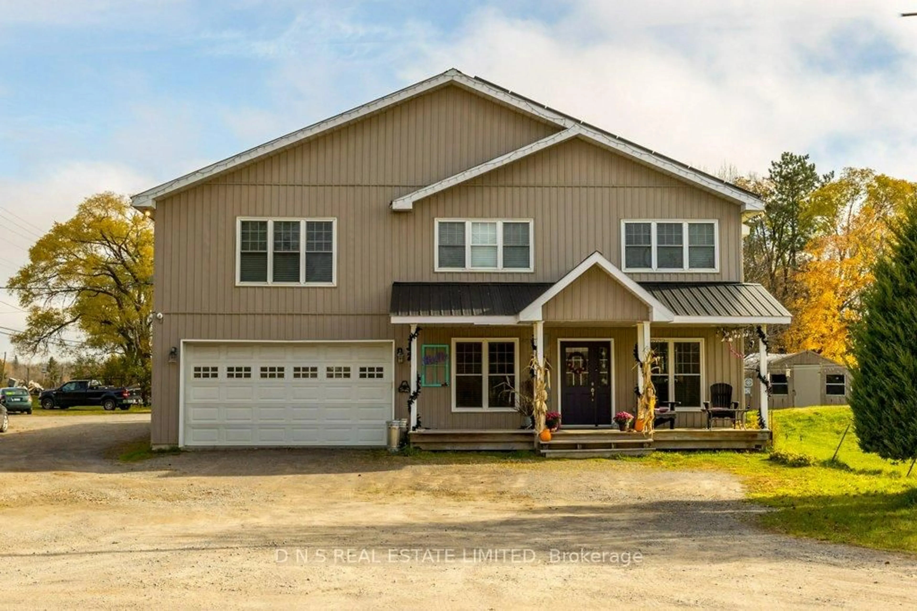 Home with vinyl exterior material, street for 2219 Burnham Line, Otonabee-South Monaghan Ontario K9J 6X7