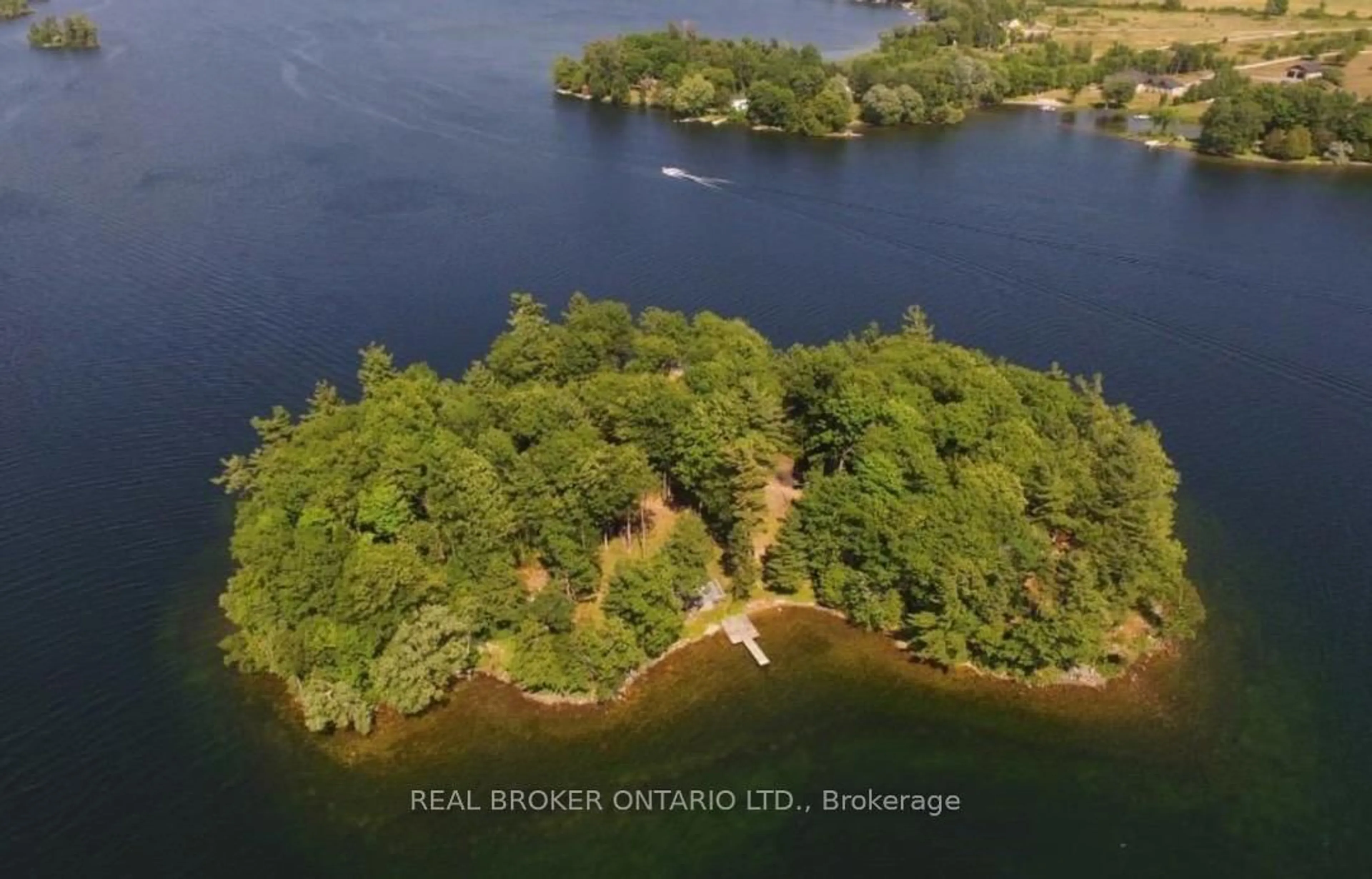 A pic from outside/outdoor area/front of a property/back of a property/a pic from drone, water/lake/river/ocean view for 101 Fairclough Island, Perth Ontario K7H 3C7