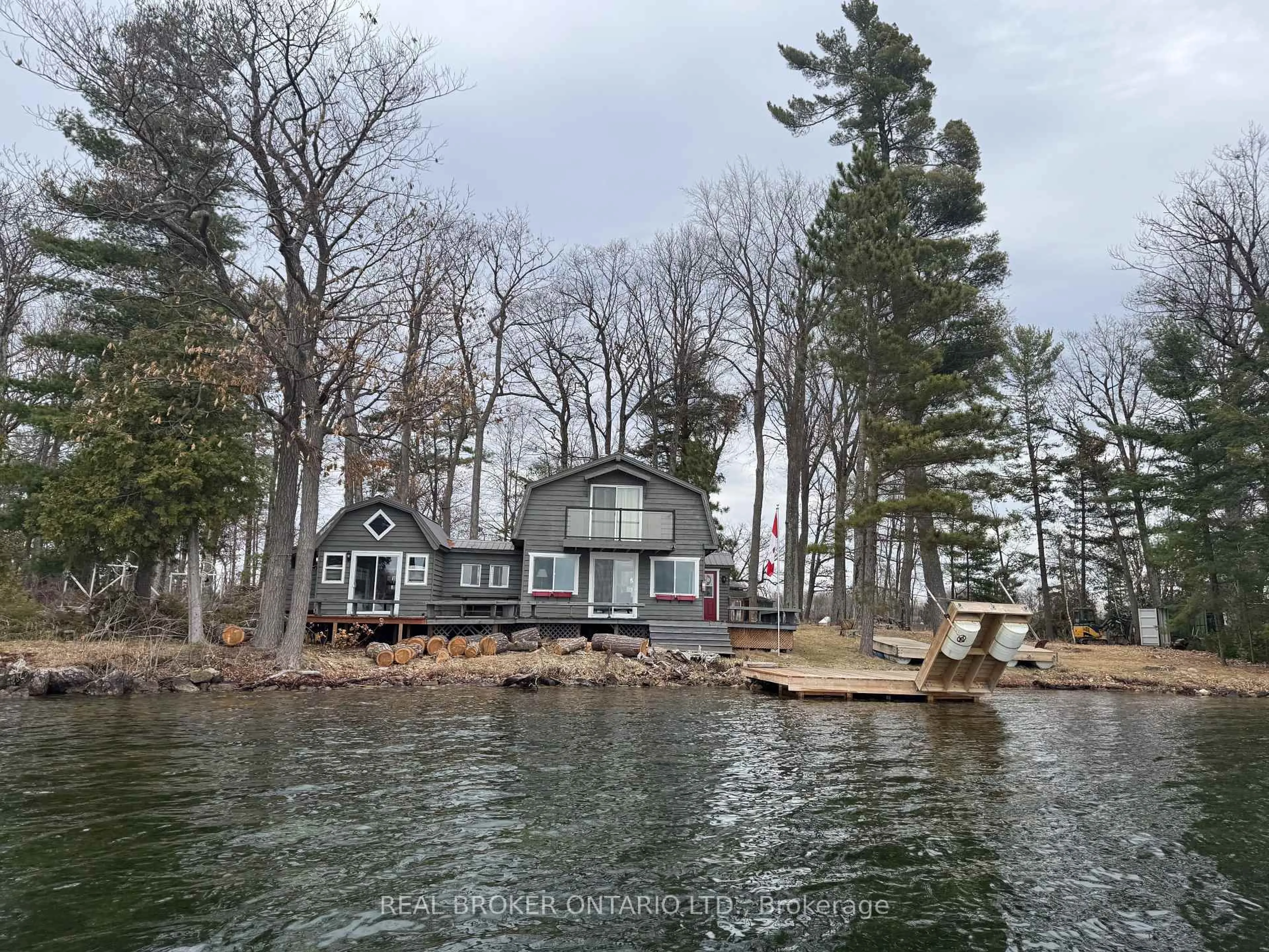 A pic from outside/outdoor area/front of a property/back of a property/a pic from drone, water/lake/river/ocean view for 101 Fairclough Island, Perth Ontario K7H 3C7